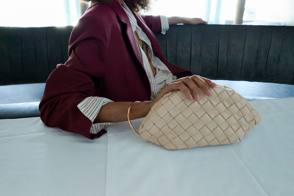 Braided leather clutch bag