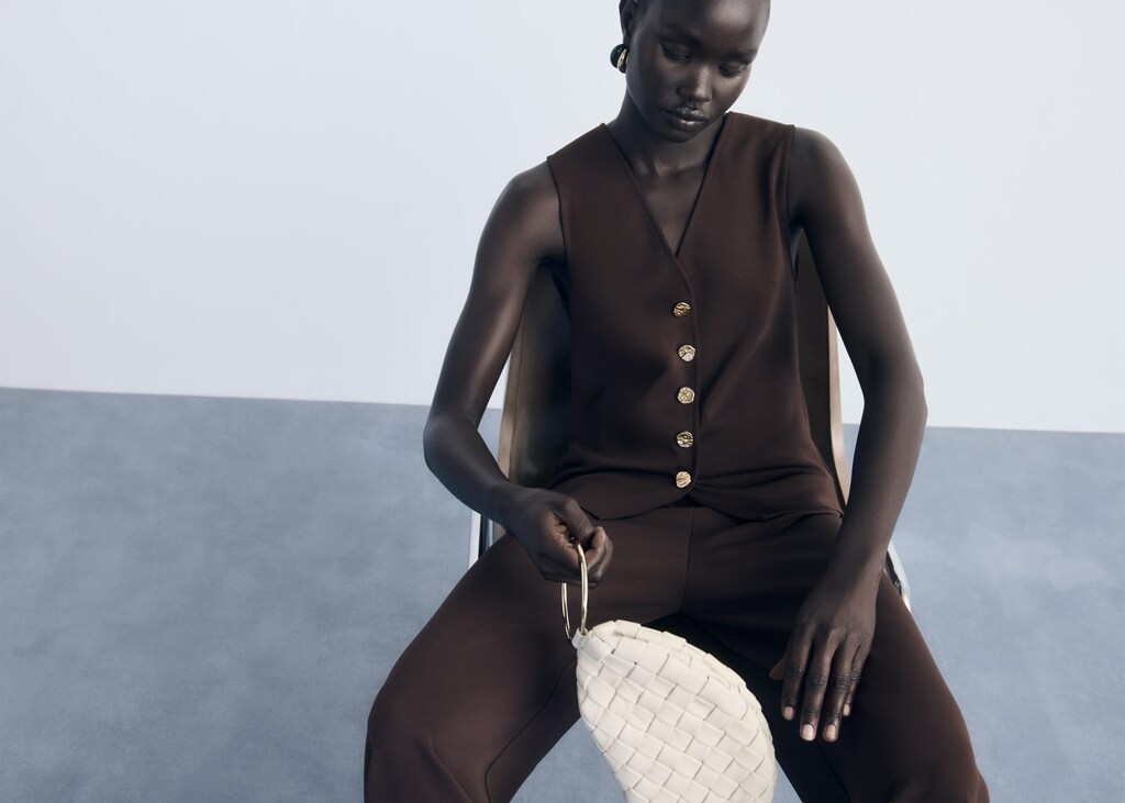 Vest with jewel buttons