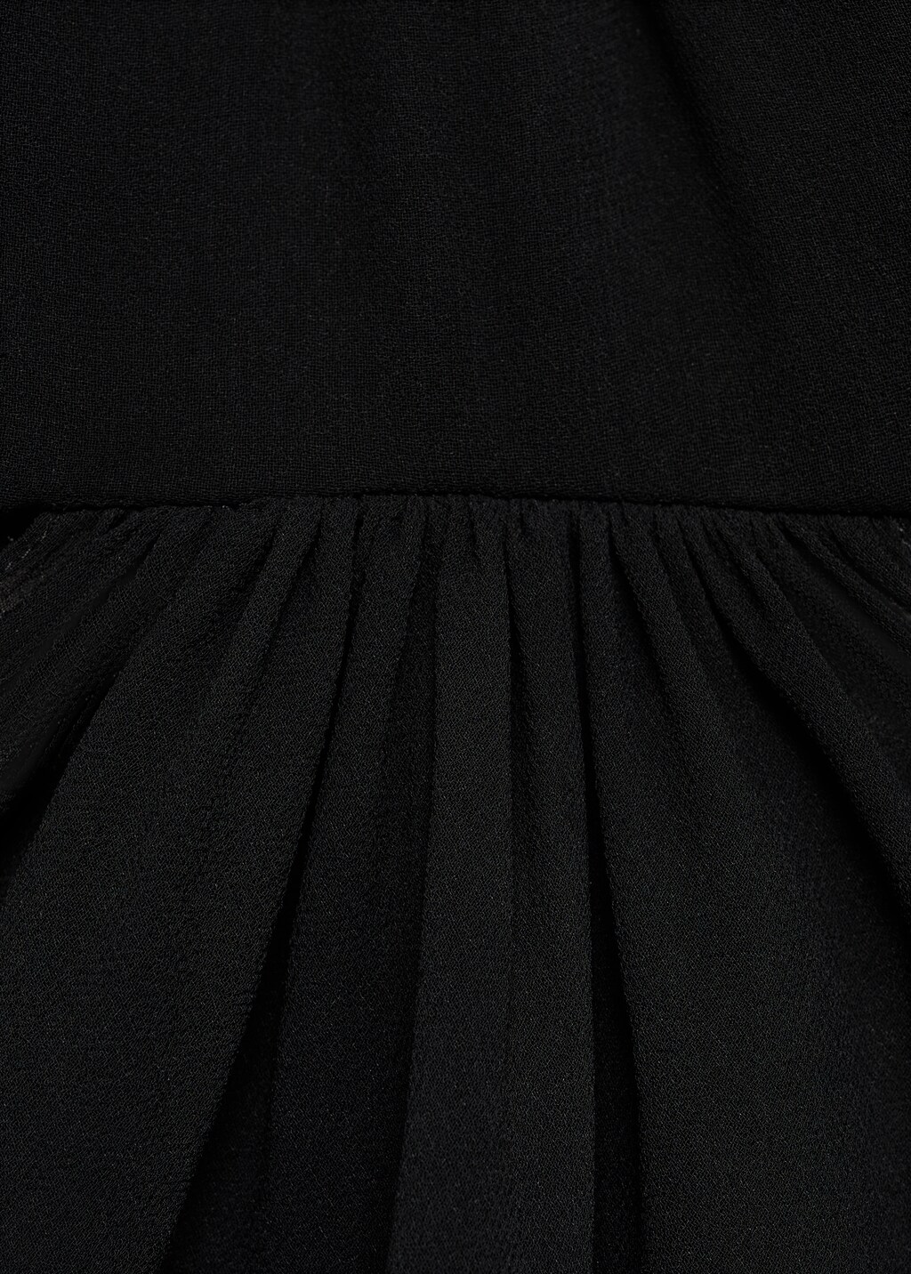 Dress with asymmetrical hem and cut-out