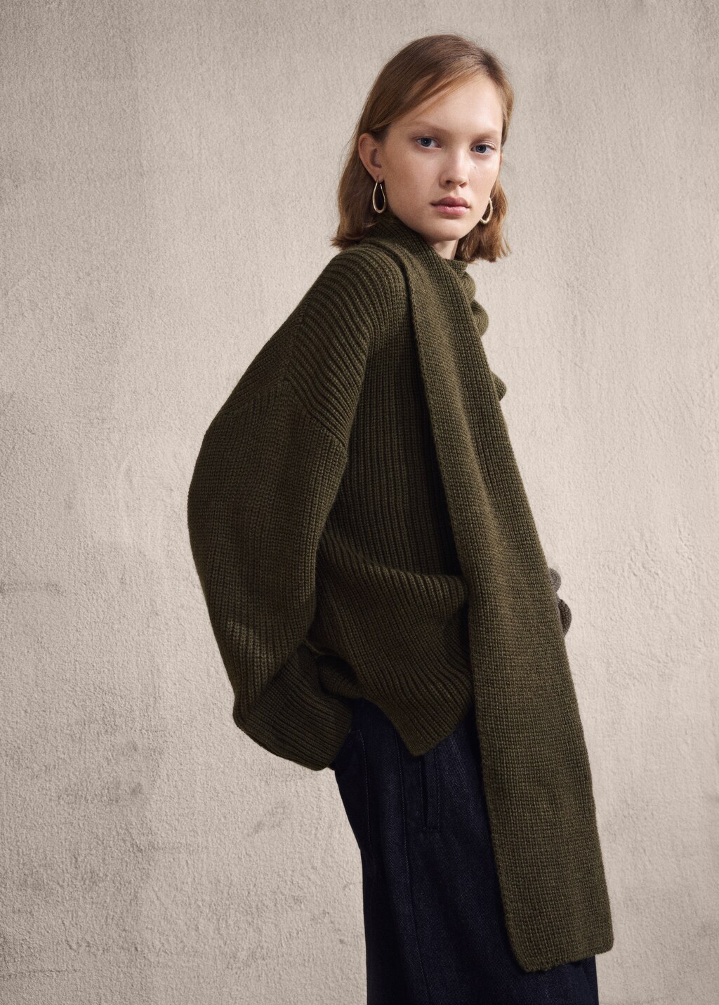 Knitted sweater with scarf