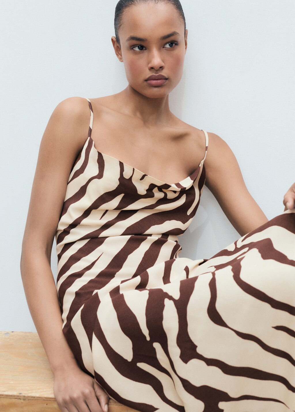 Zebra-print dress with draped neckline