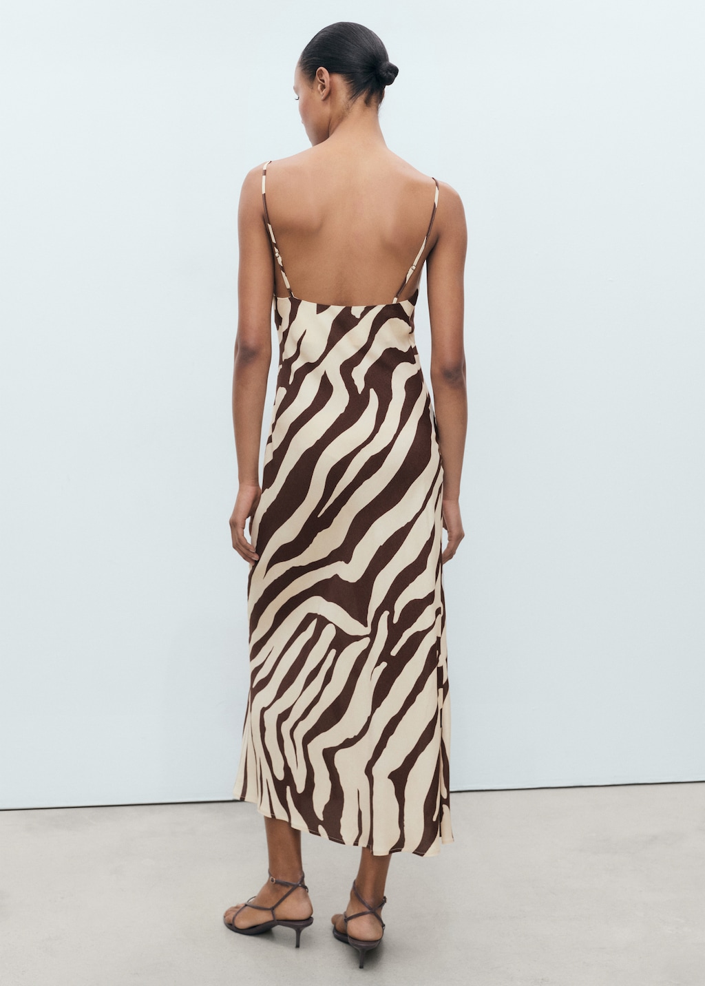 Zebra-print dress with draped neckline