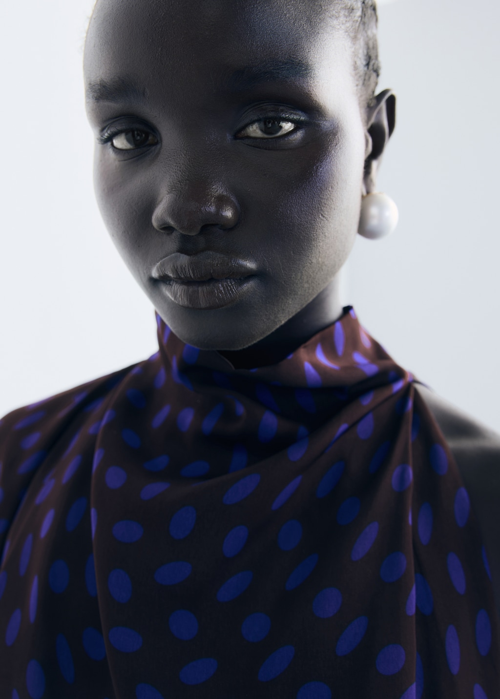 Polka-dot blouse with draped collar