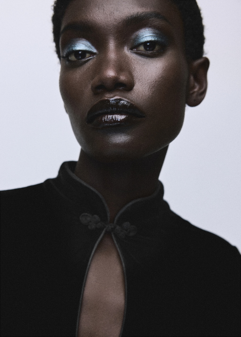 Velvet dress with toggle fastenings and slit