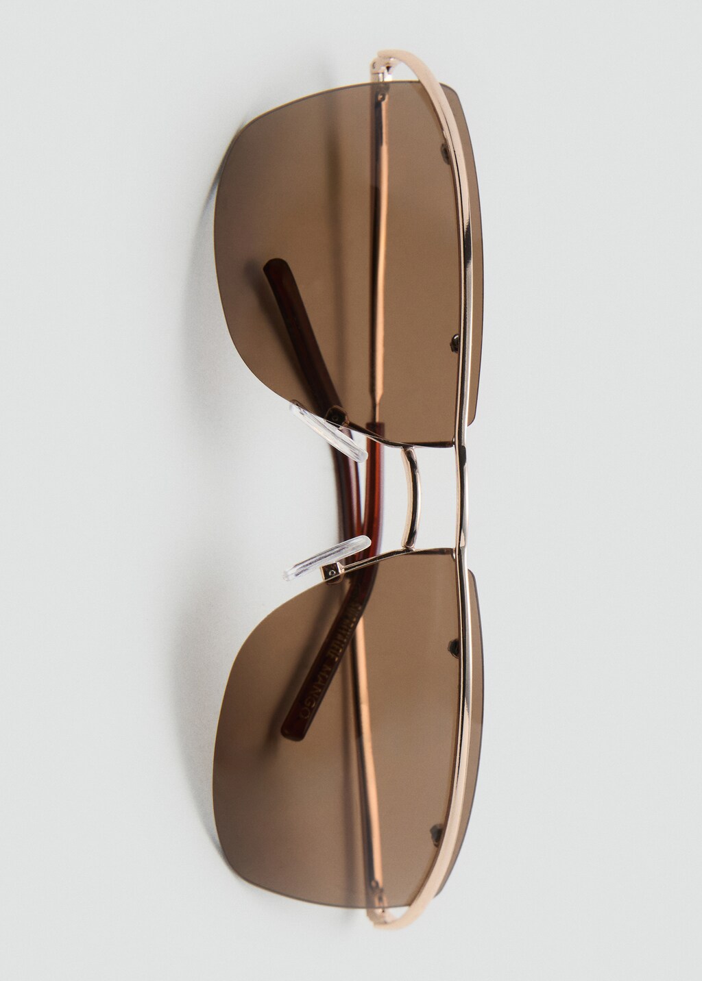 Frameless sunglasses with metal temples