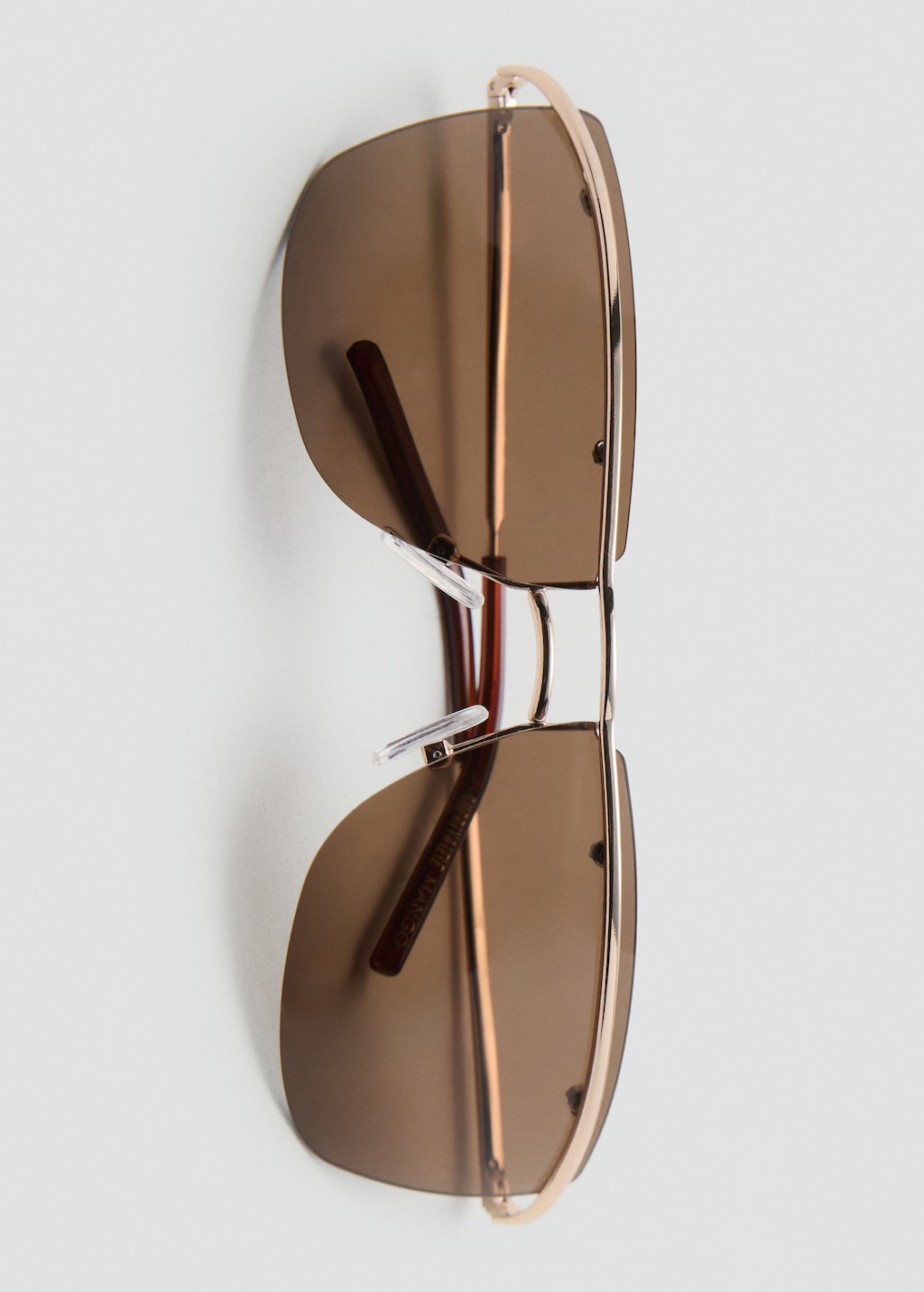 Frameless sunglasses with metal temples