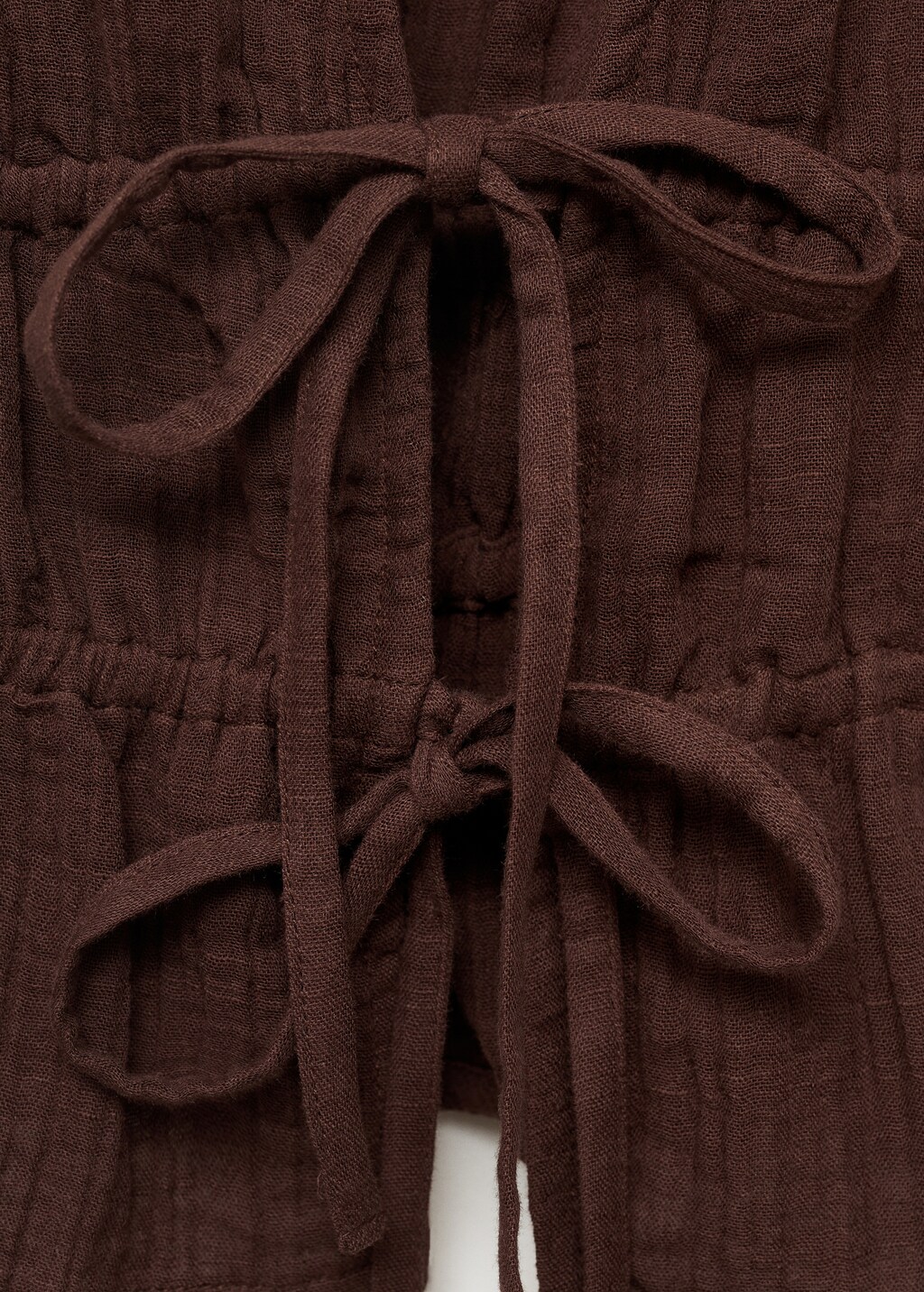 Ruffled top with bows