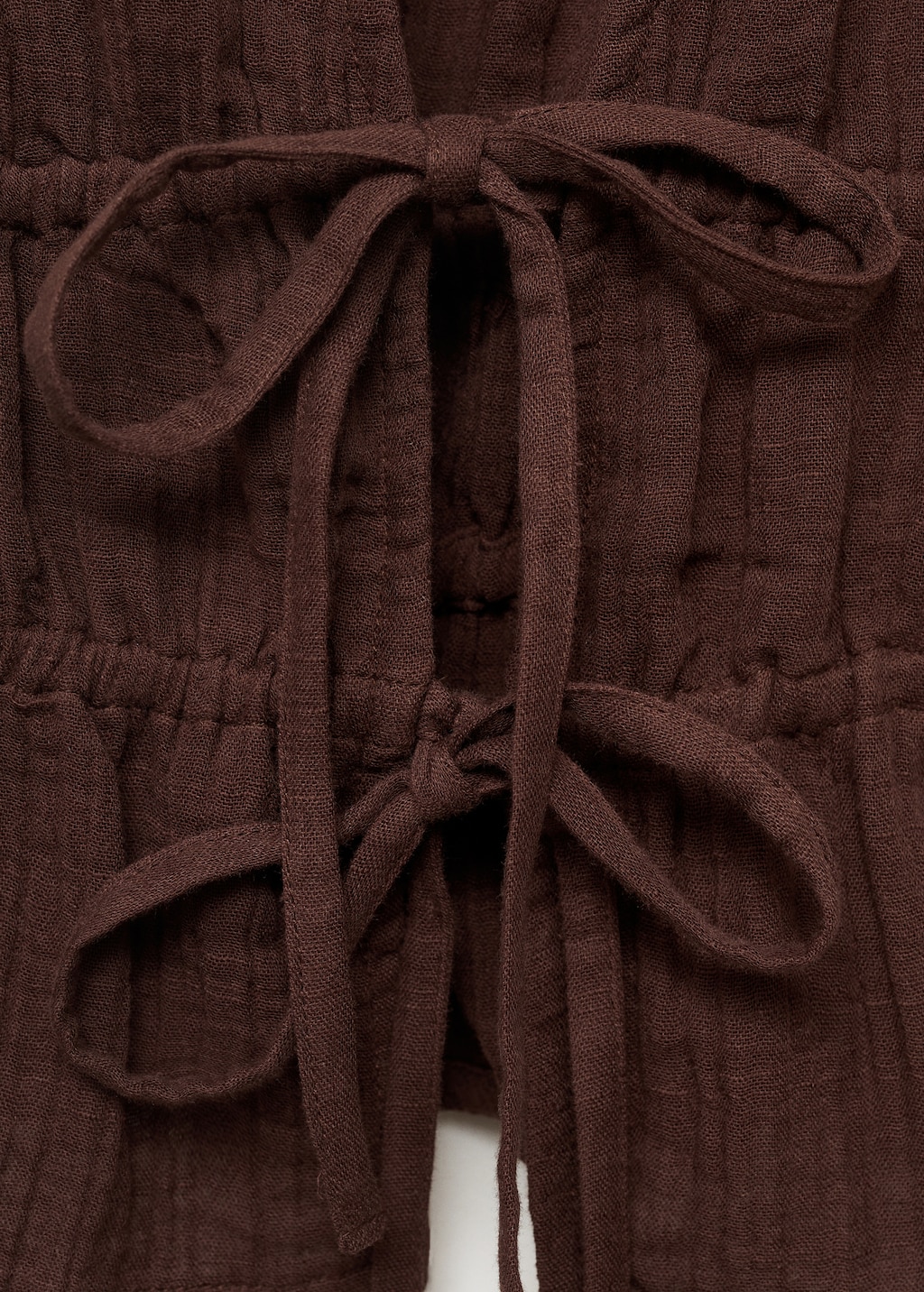 Ruffled top with bows