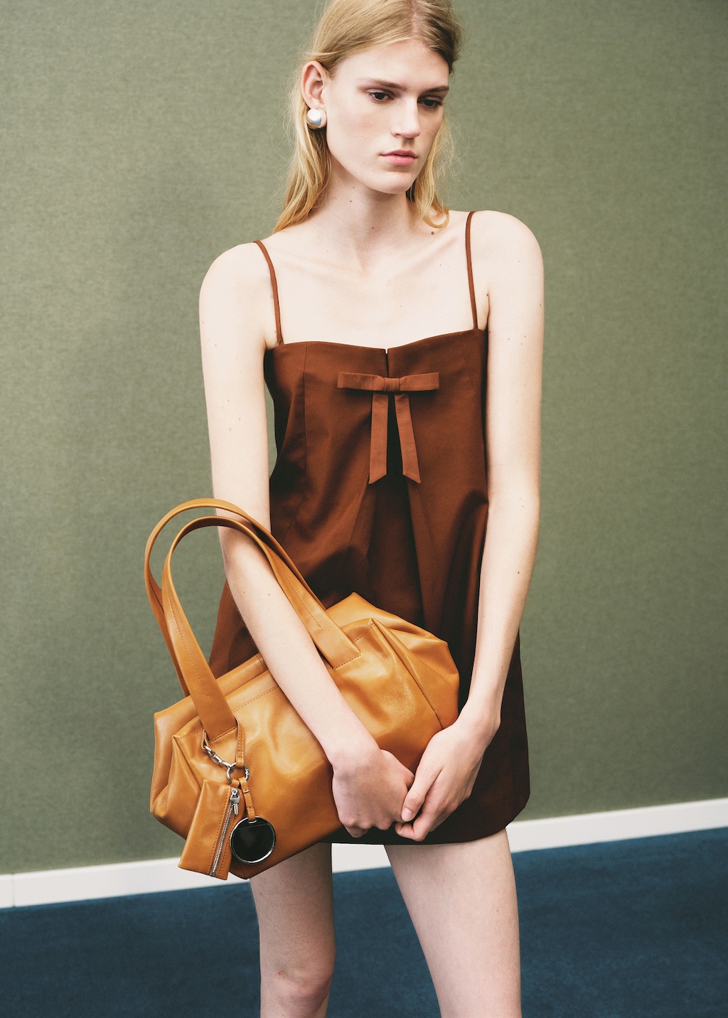 Dress with bow neckline