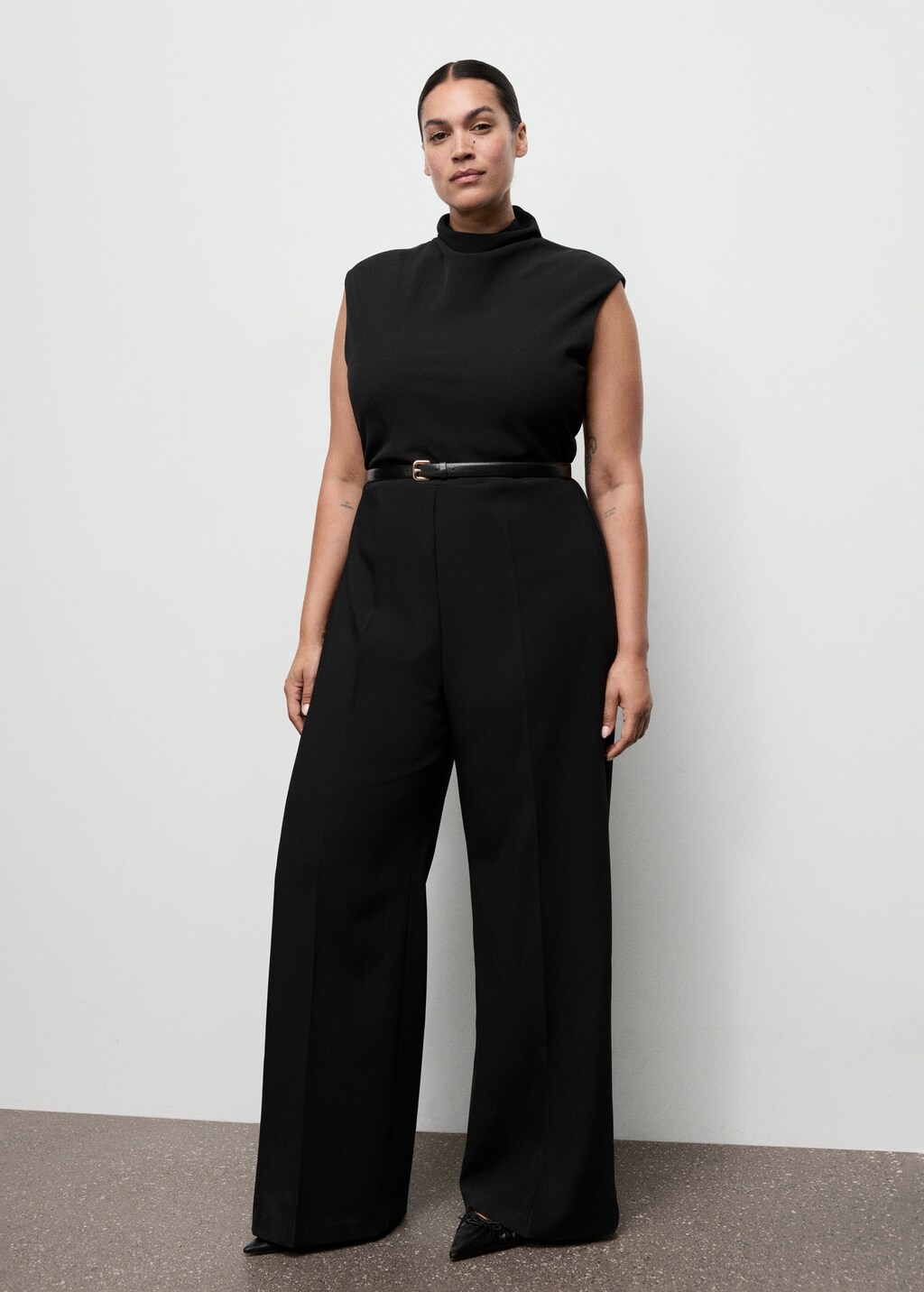 Jumpsuit with draped neck and belt