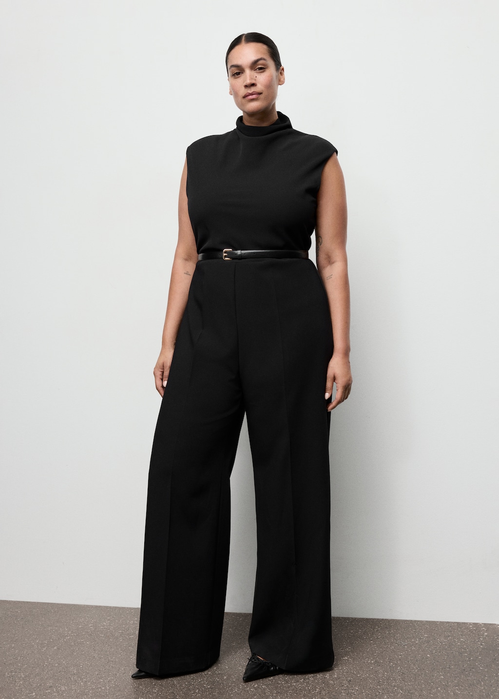Jumpsuit with draped neck and belt