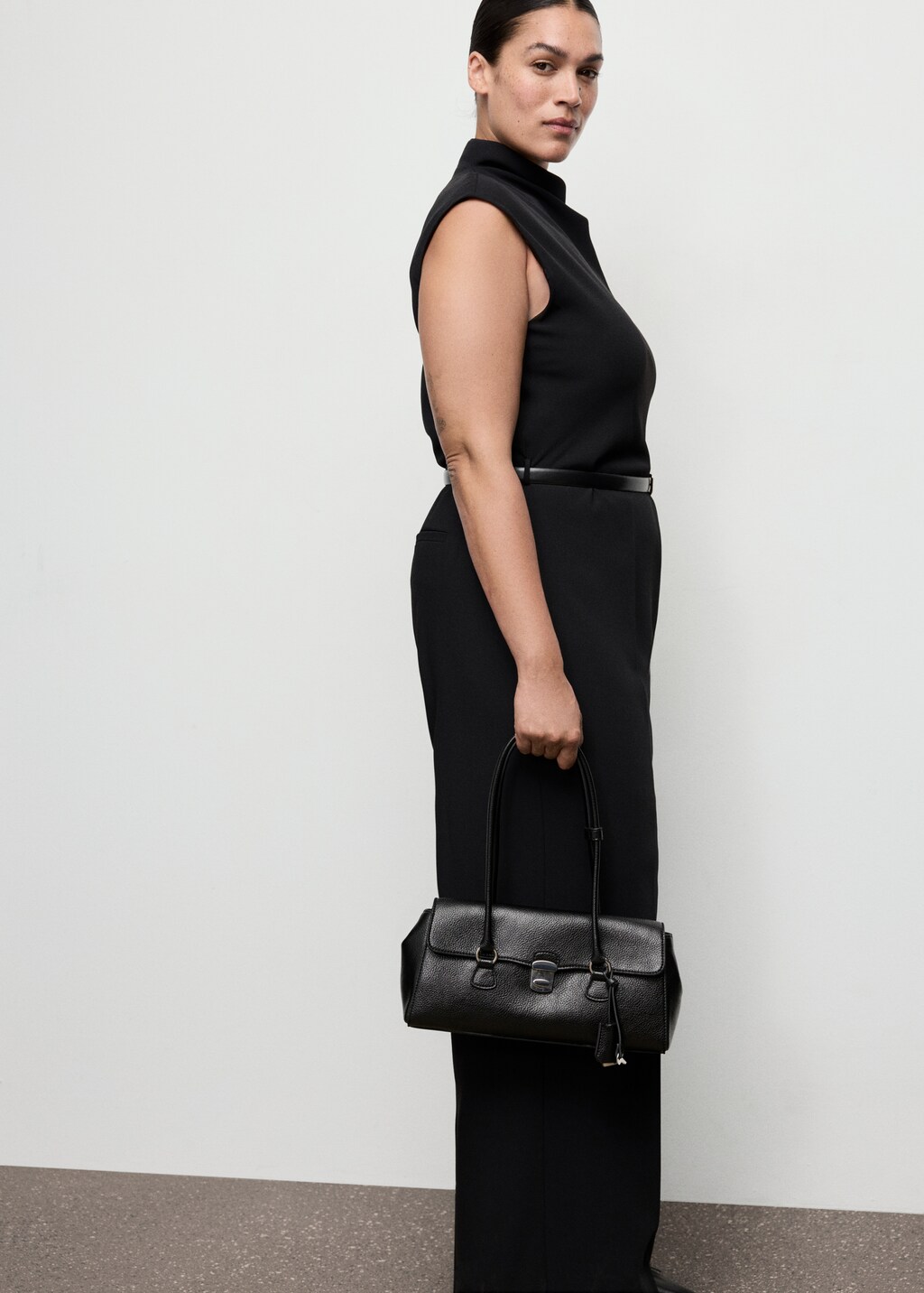 Jumpsuit with draped neck and belt