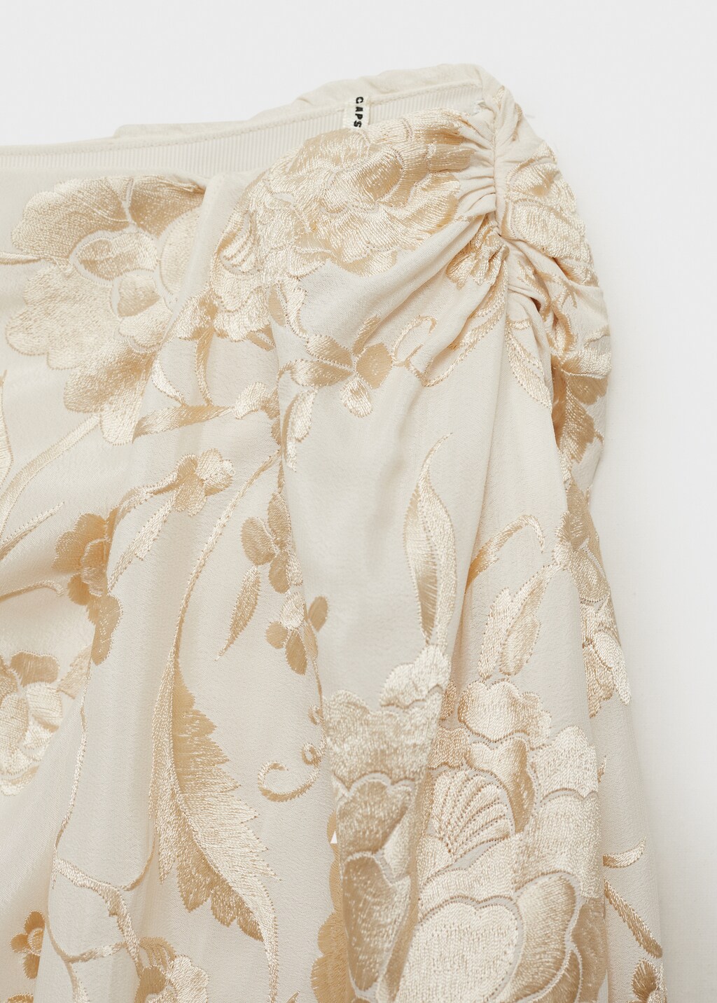 Pareo-style skirt with embroidered fringe