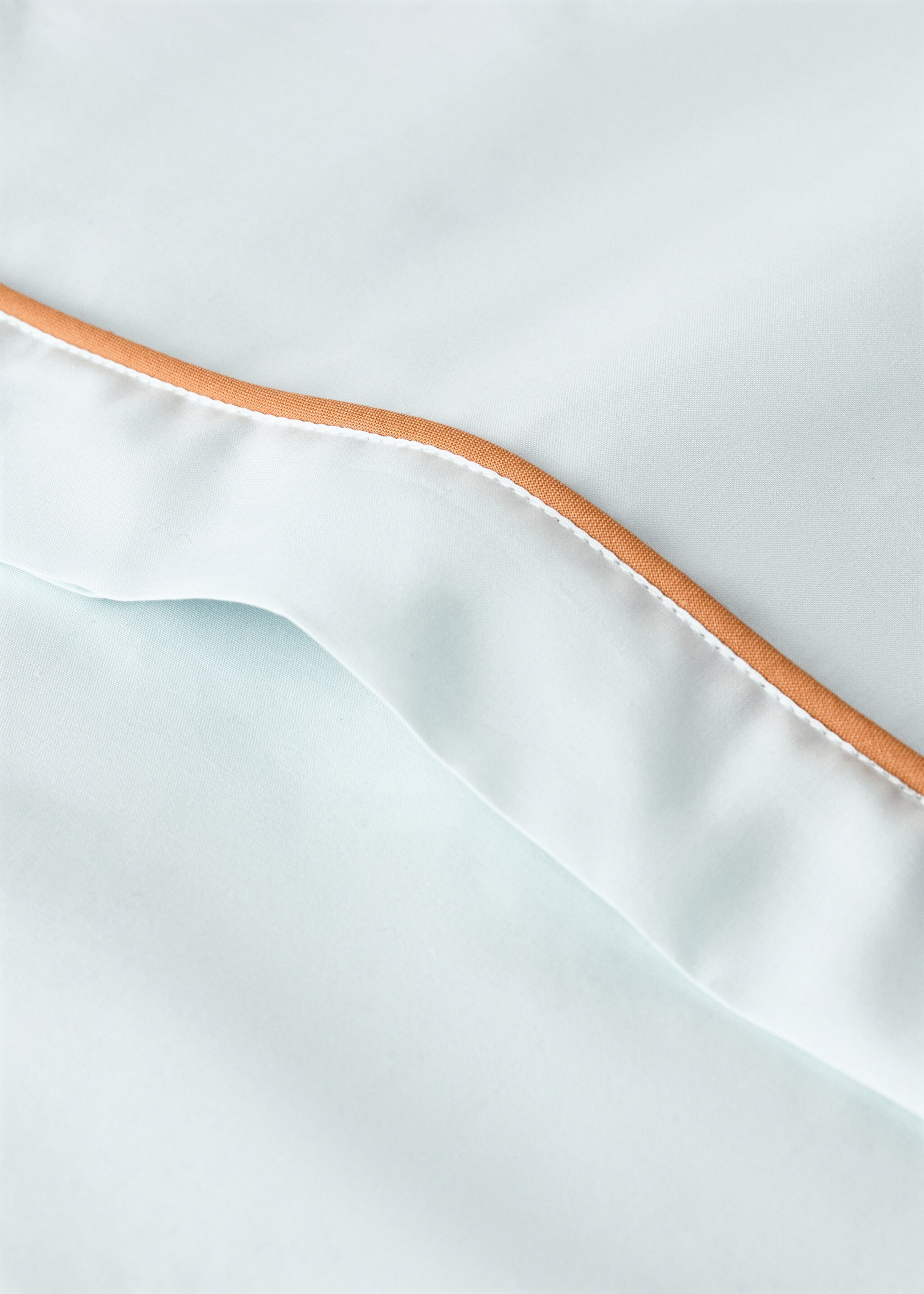 Reversible percale cotton children's pillowcase with contrast piping 45x110 cm - Details of the article 2, Aqua Green. Ref: 27004084-00.