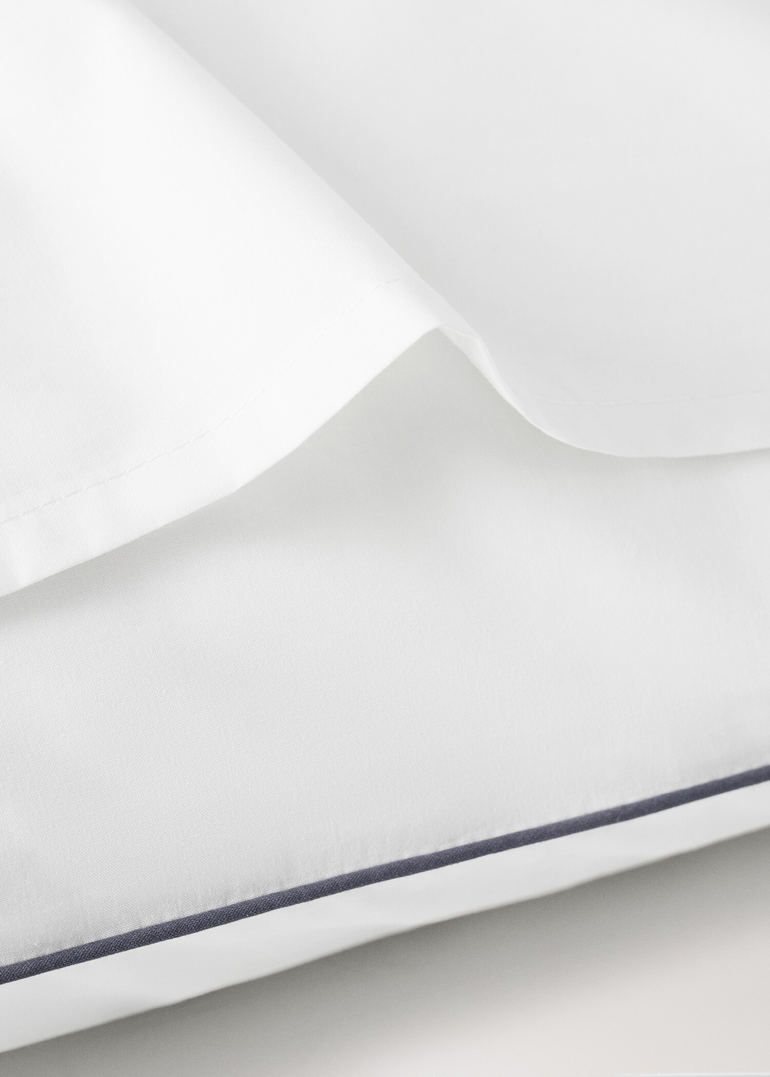 Reversible percale cotton pillowcase with contrasting piping 50x75 cm - Details of the article 2