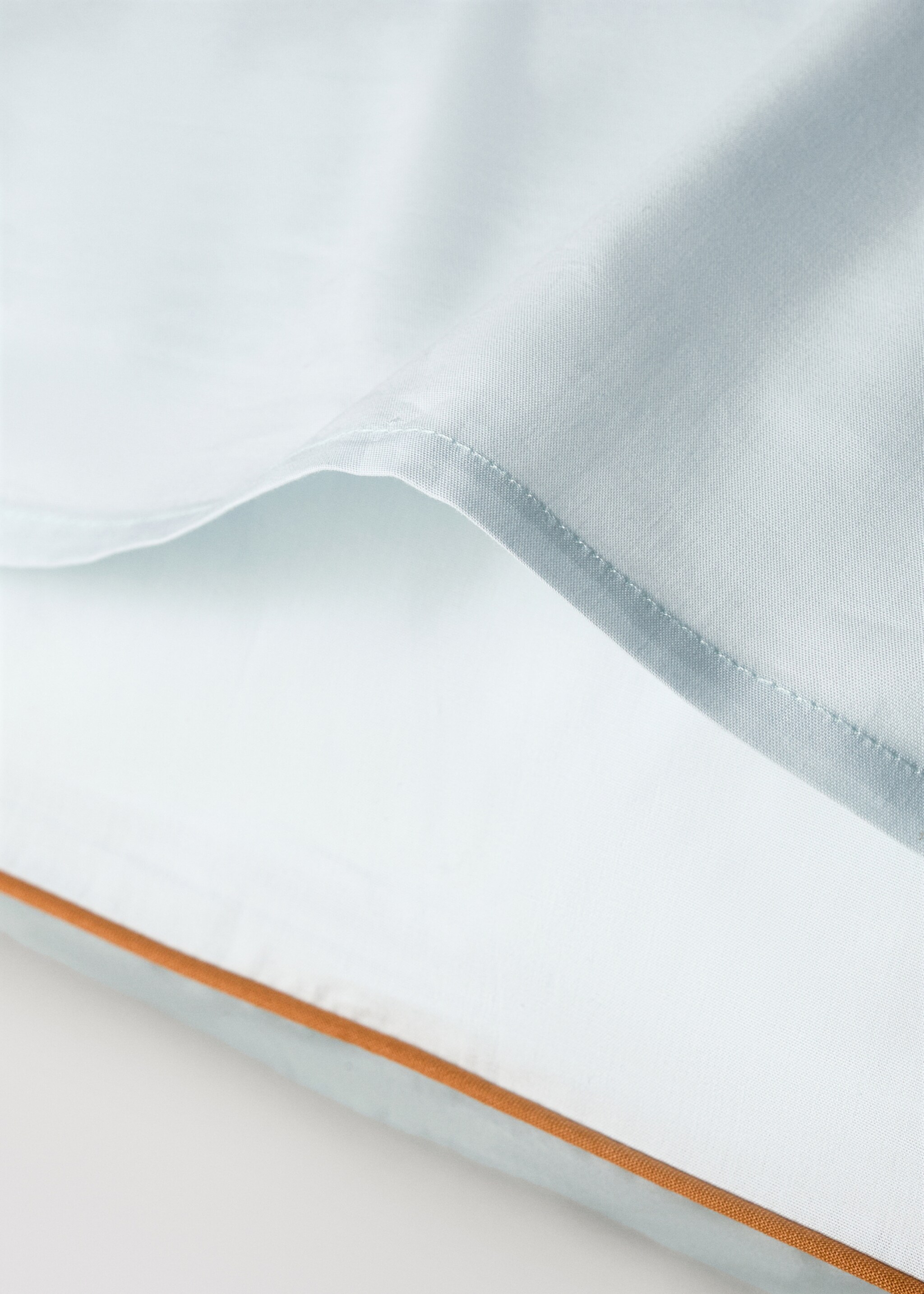 Reversible percale cotton pillowcase with contrasting piping 60x60 cm - Details of the article 2, Aqua Green. Ref: 27004086-00.