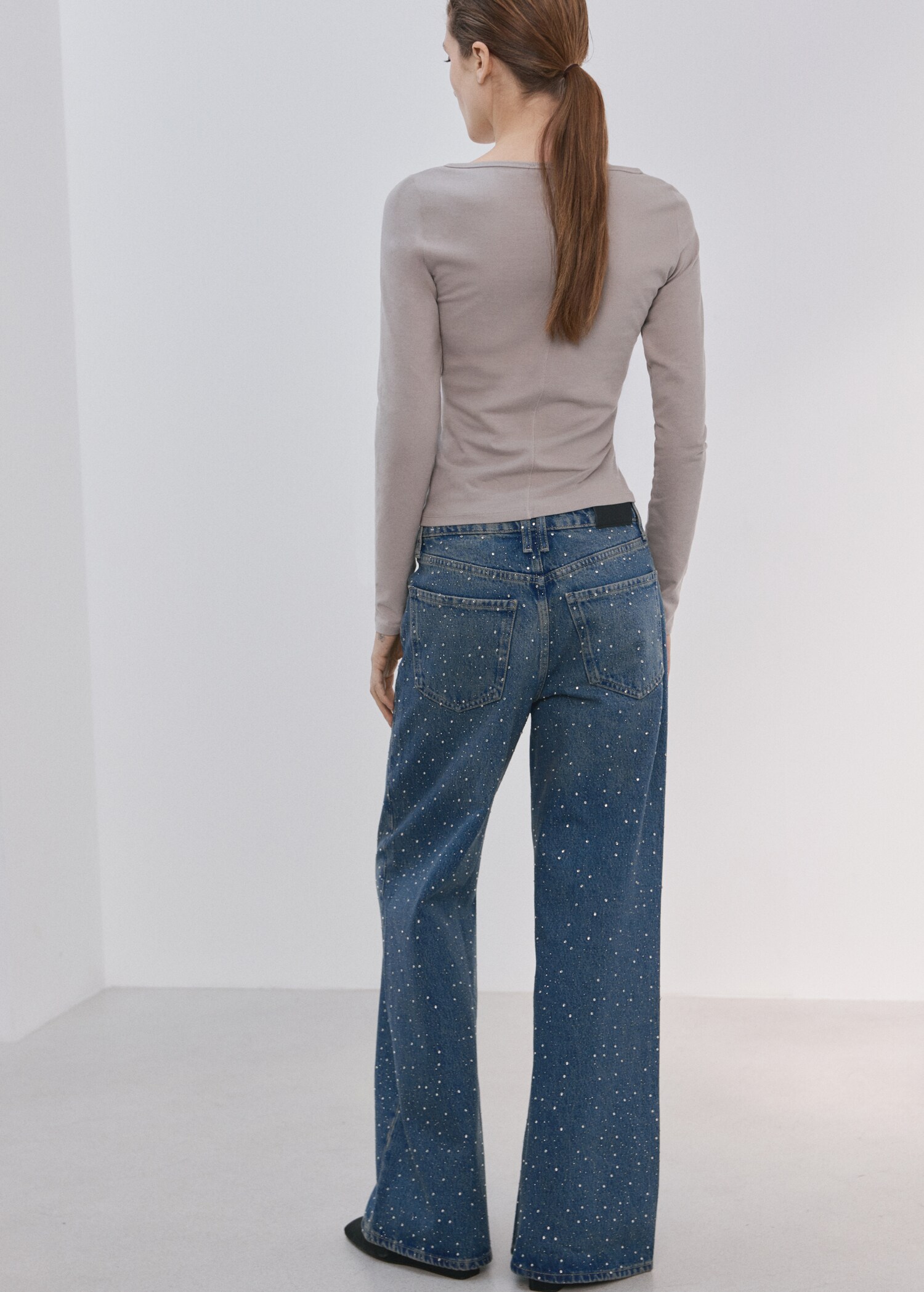 Wide leg jeans with rhinestones - Reverse of the article