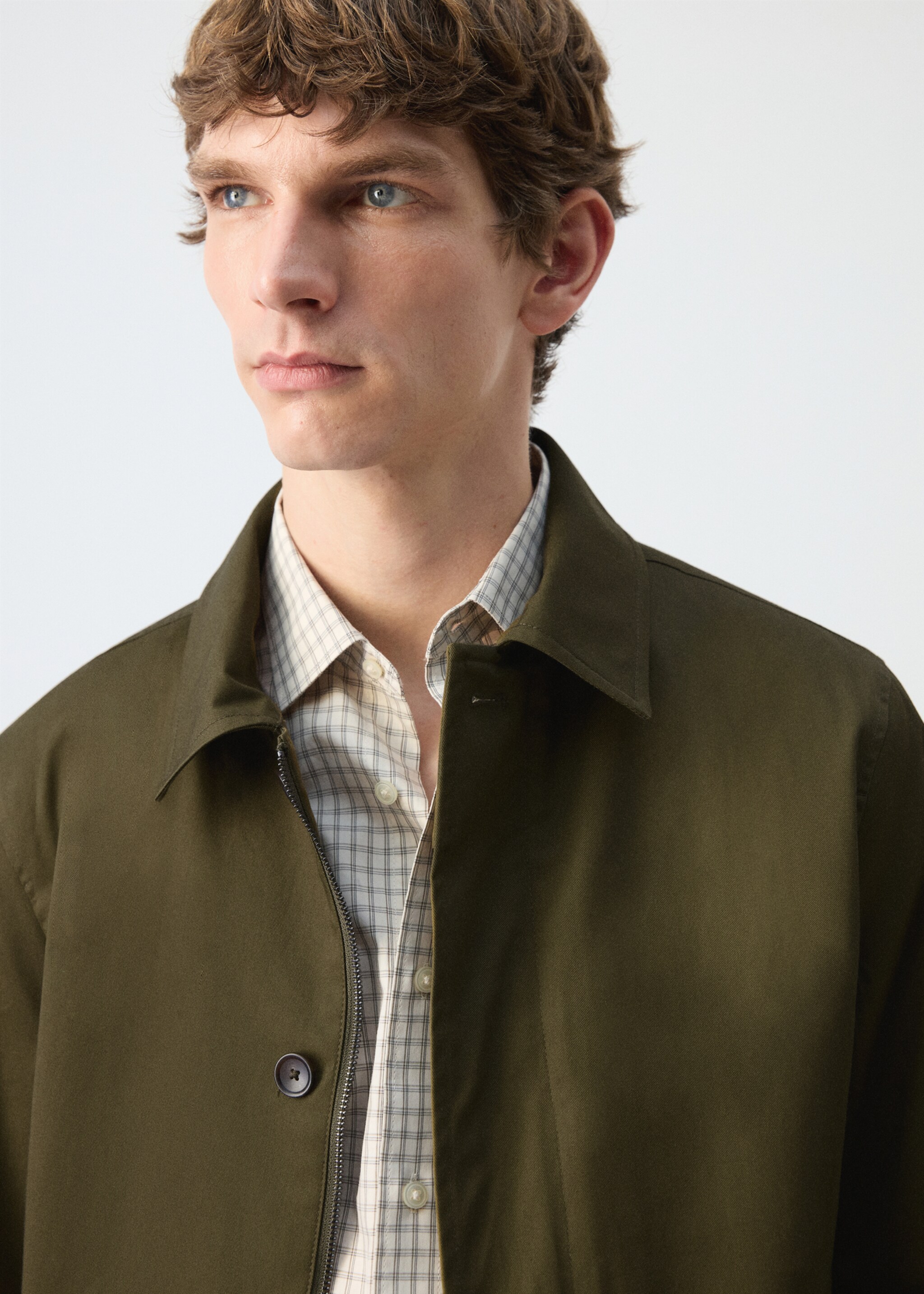 Water-repellent jacket with hidden zip - Details of the article 1, Olive Green. Ref: 27004412-00.