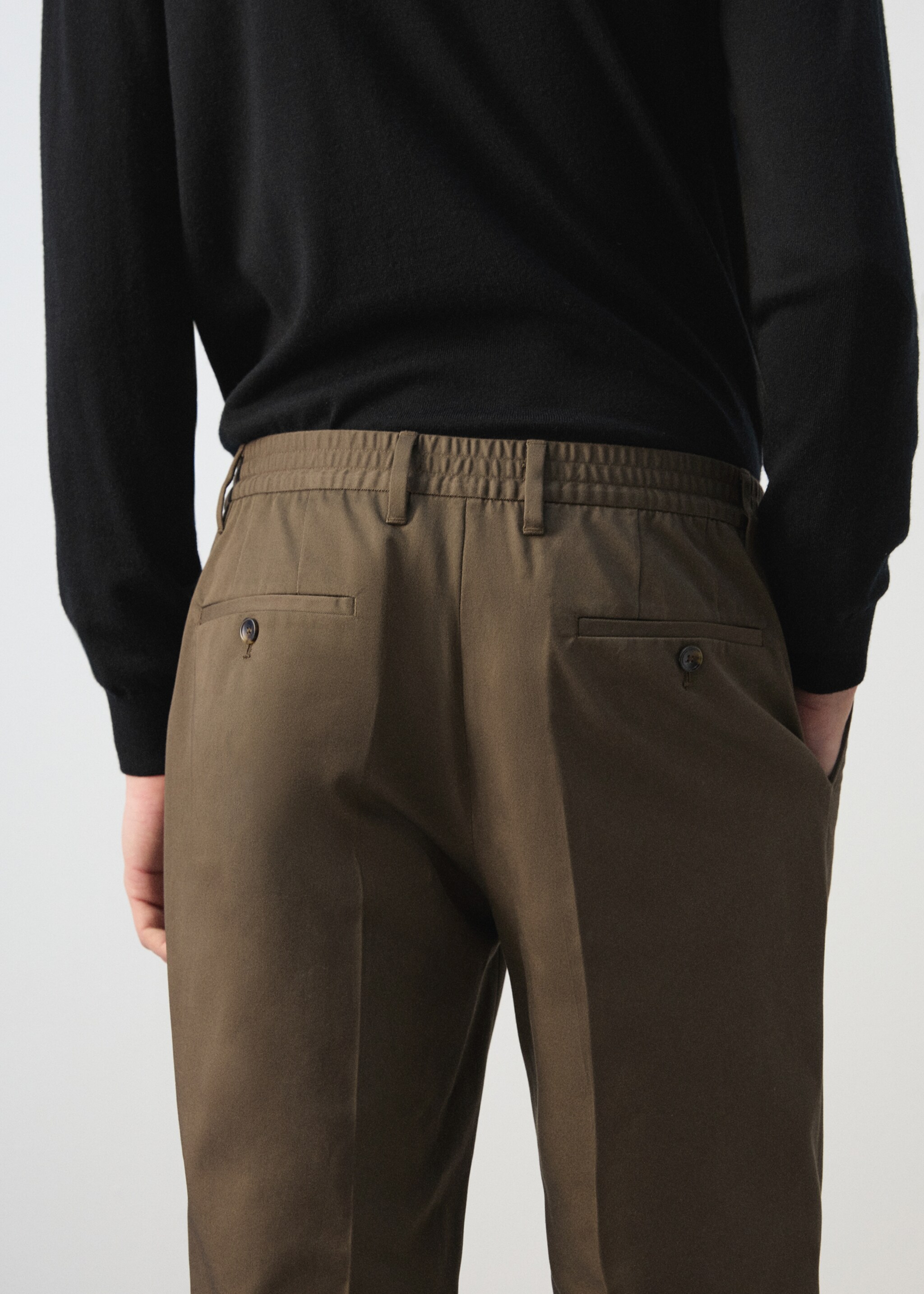 Pleated trousers with elastic waistband - Details of the article 6, Brown. Ref: 27004413-00.