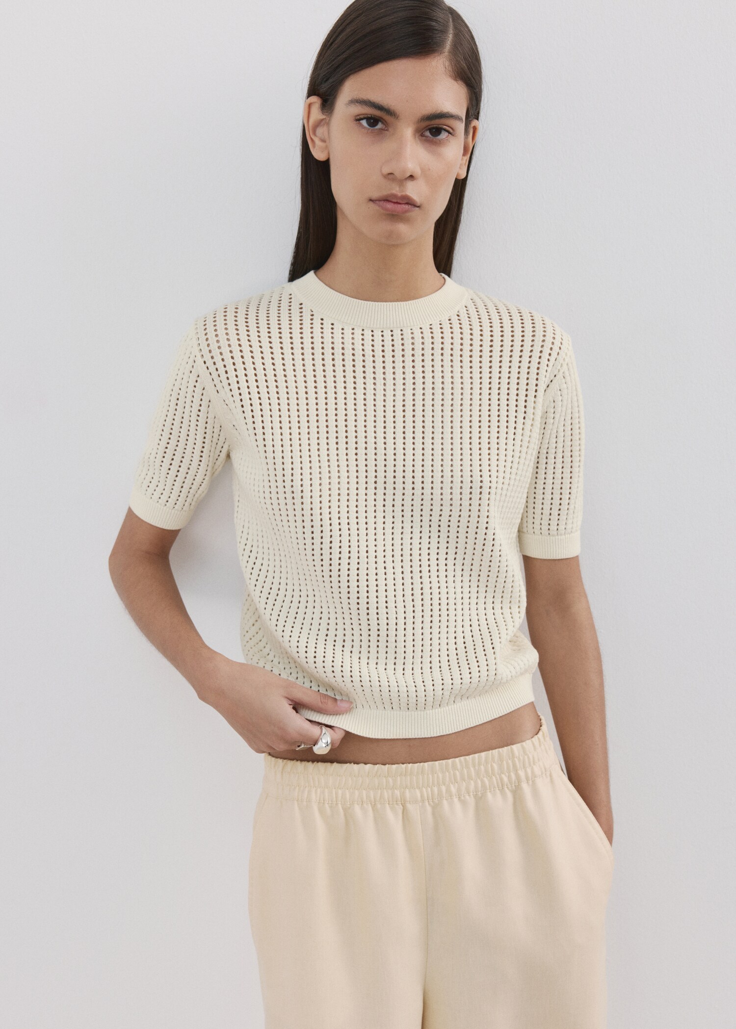 Short-sleeved openwork knitted sweater - Medium plane
