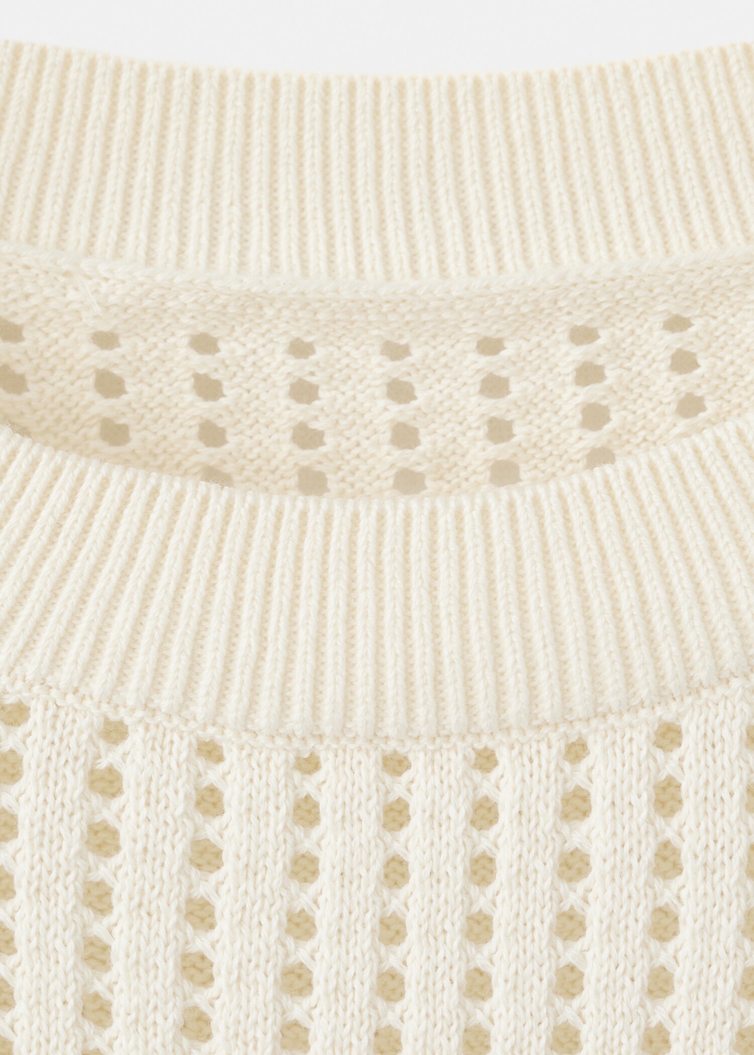 Short-sleeved openwork knitted sweater - Details of the article 8