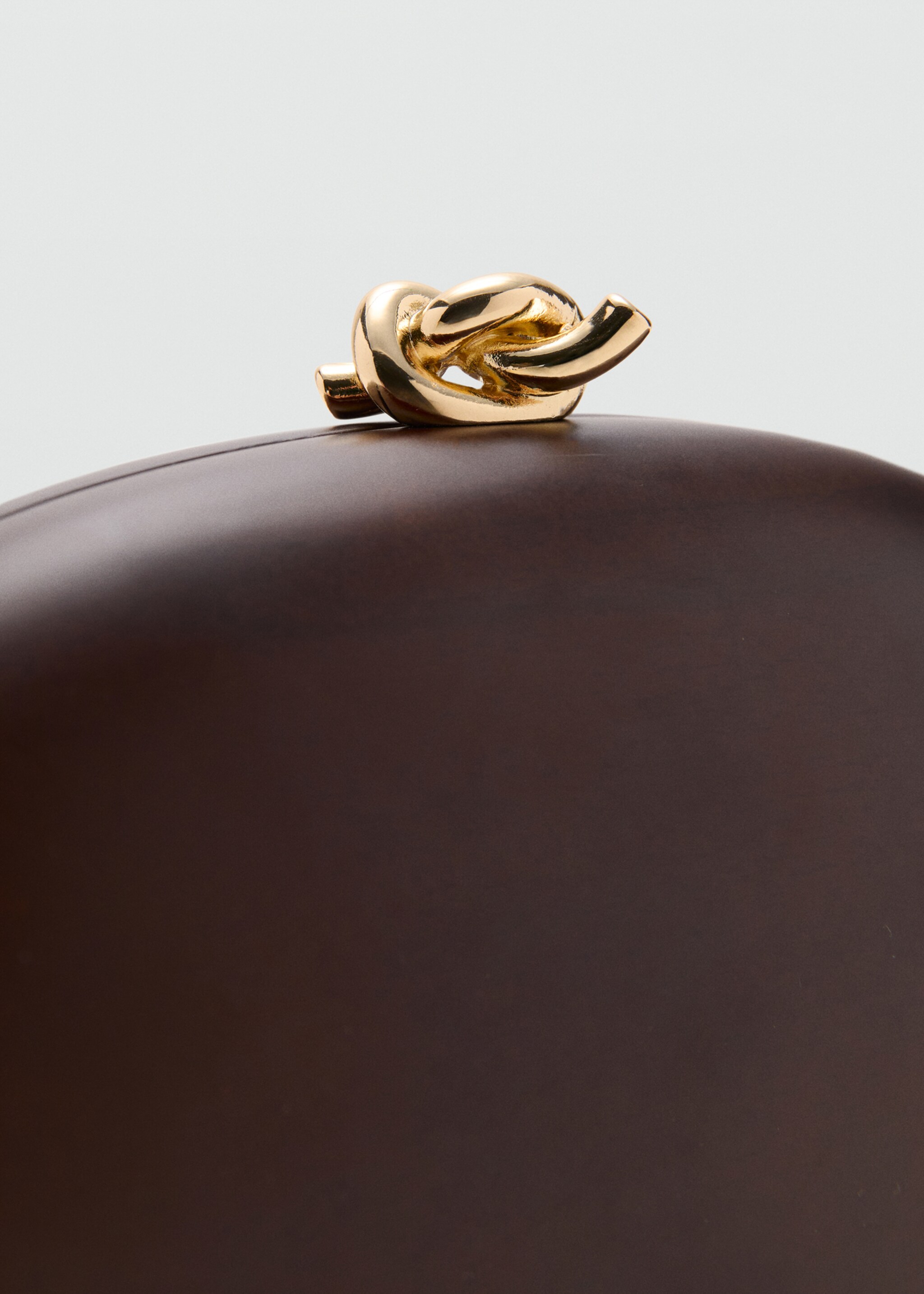 Oval clutch bag - Details of the article 1, Brown. Ref: 27007141-00.