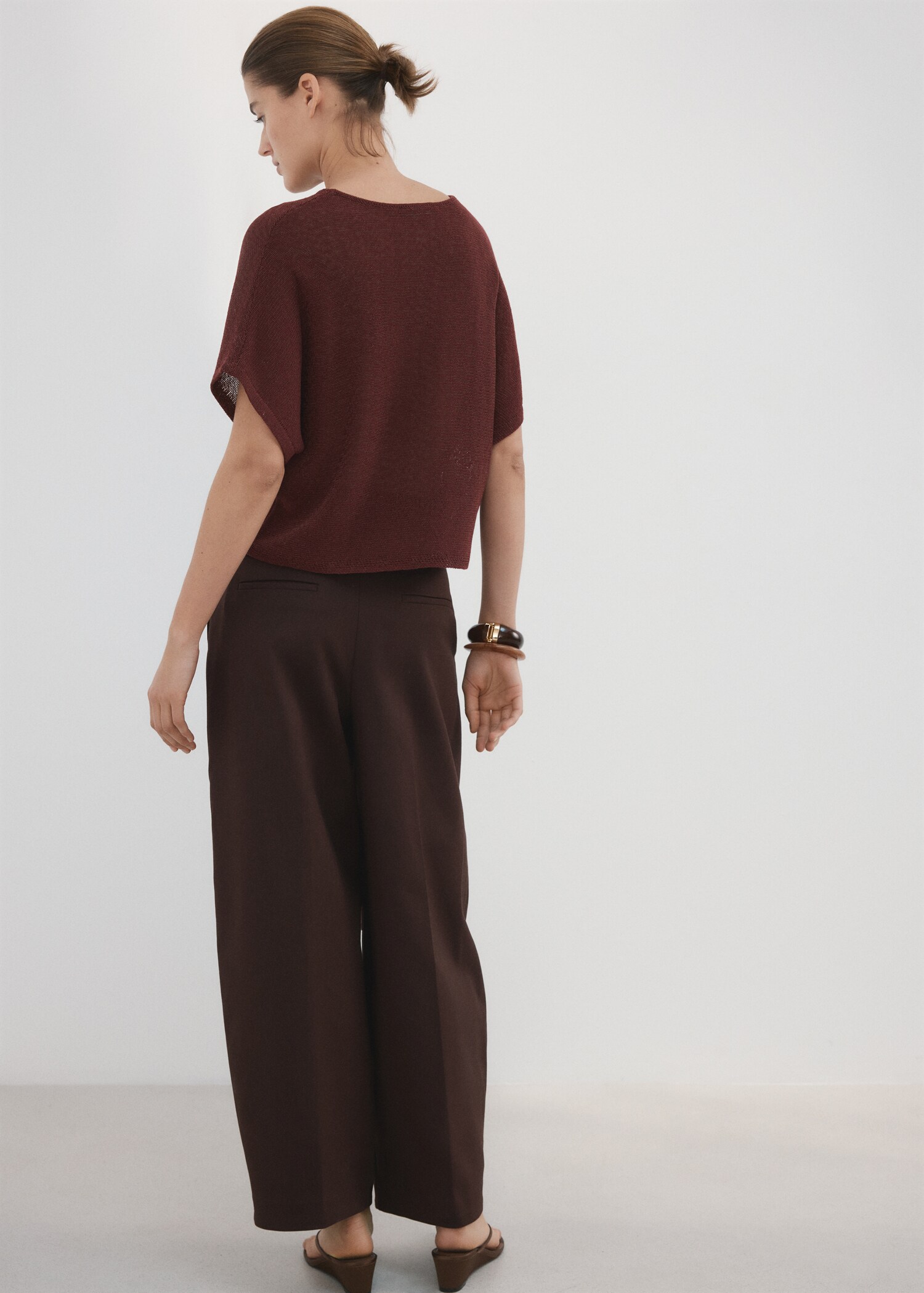 Short-sleeved knitted sweater - Reverse of the article