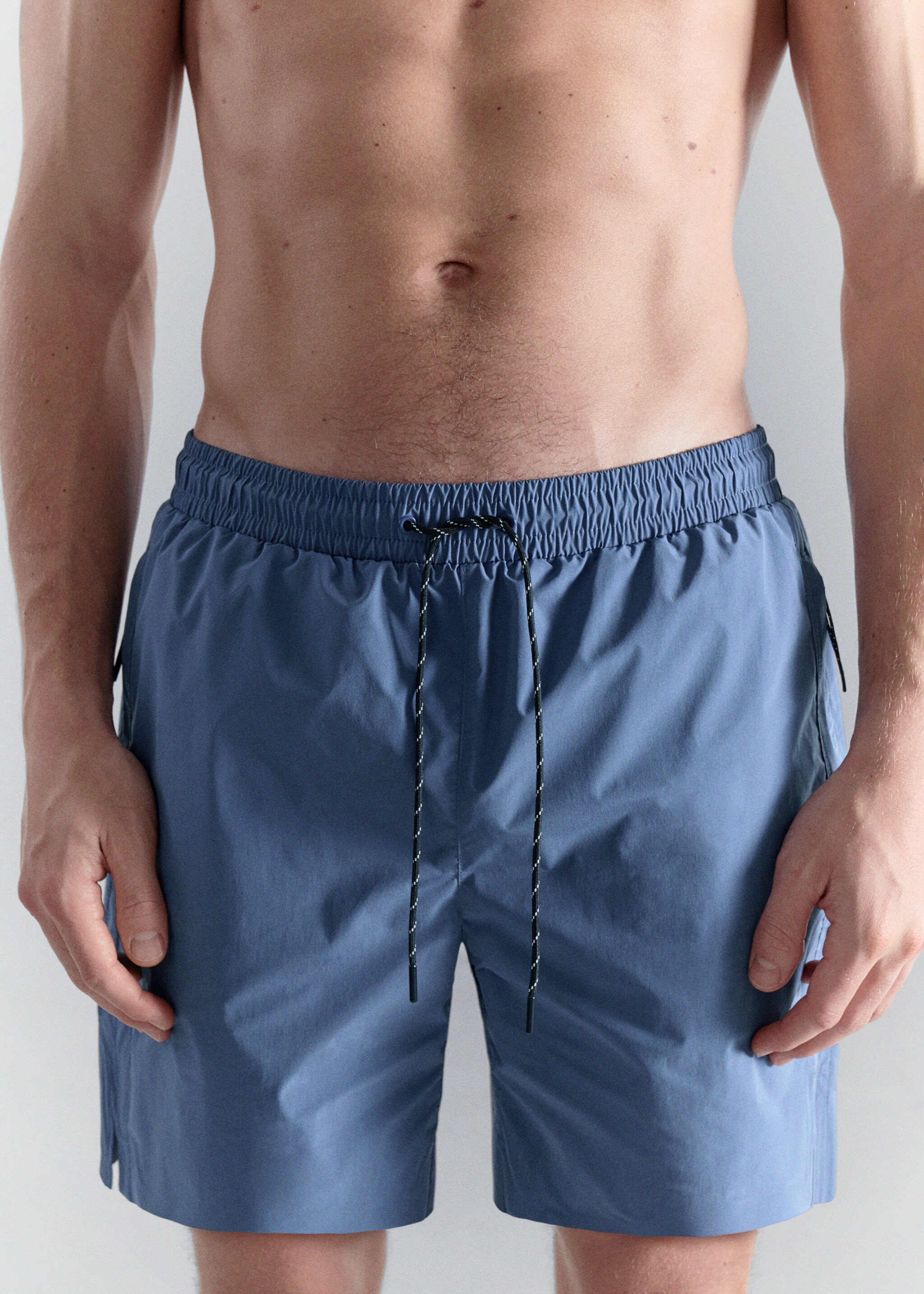 Swimsuit with zip pockets - Details of the article 1, China Blue. Ref: 27007916-00.