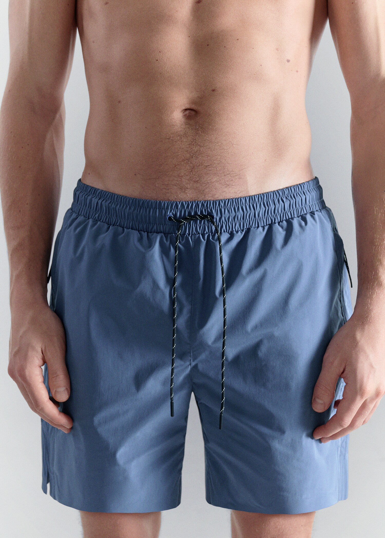 Maillot de bain à poches zippées - Détail de l'article 1