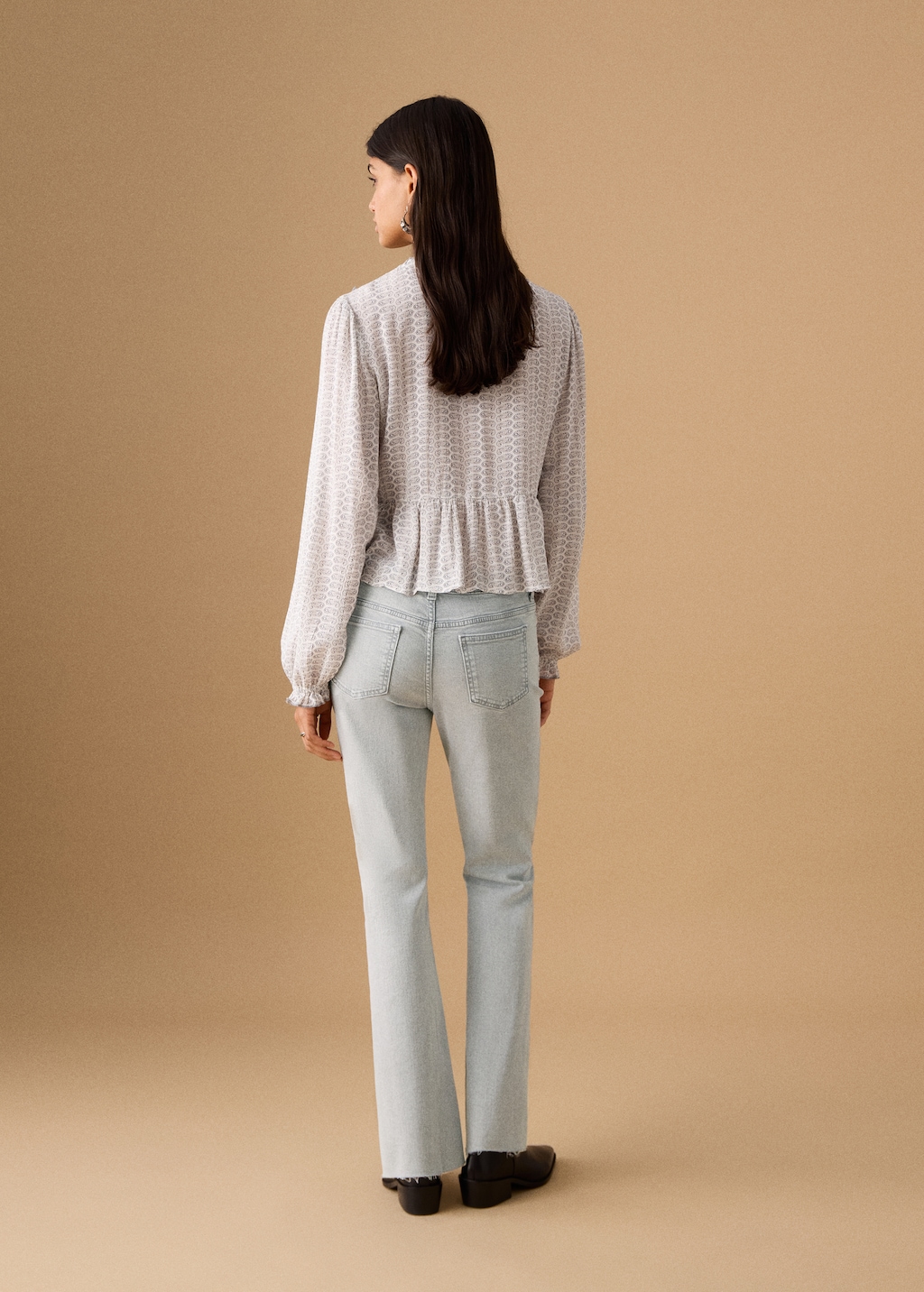 Flared cropped jeans with studs