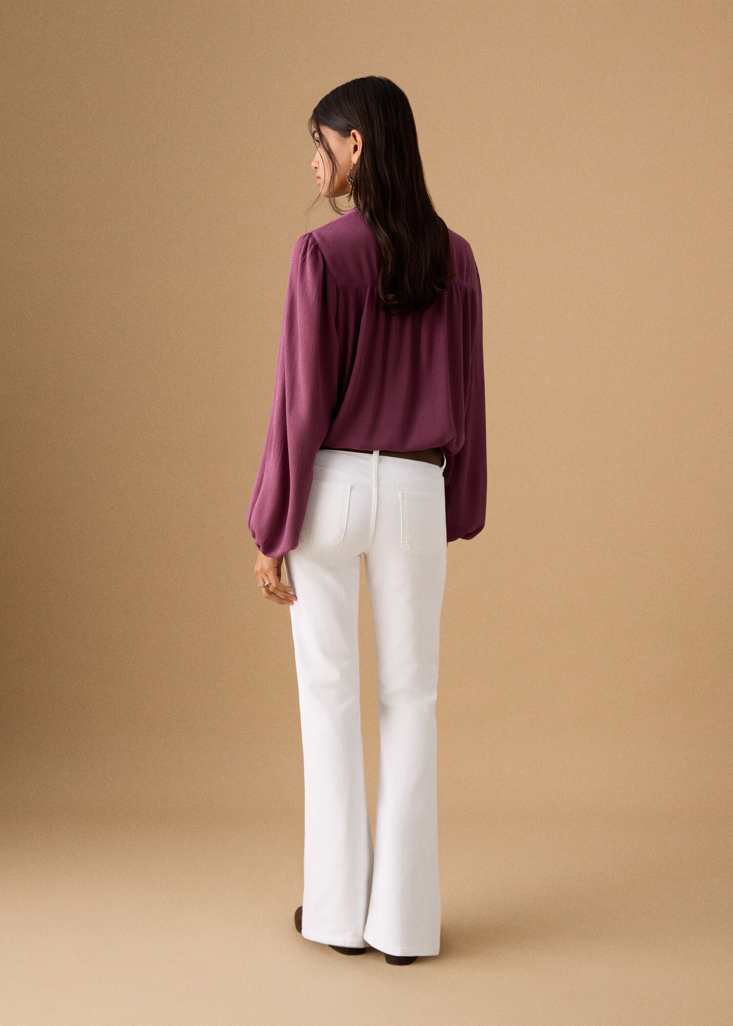 Flared jeans with studs - Reverse of the article