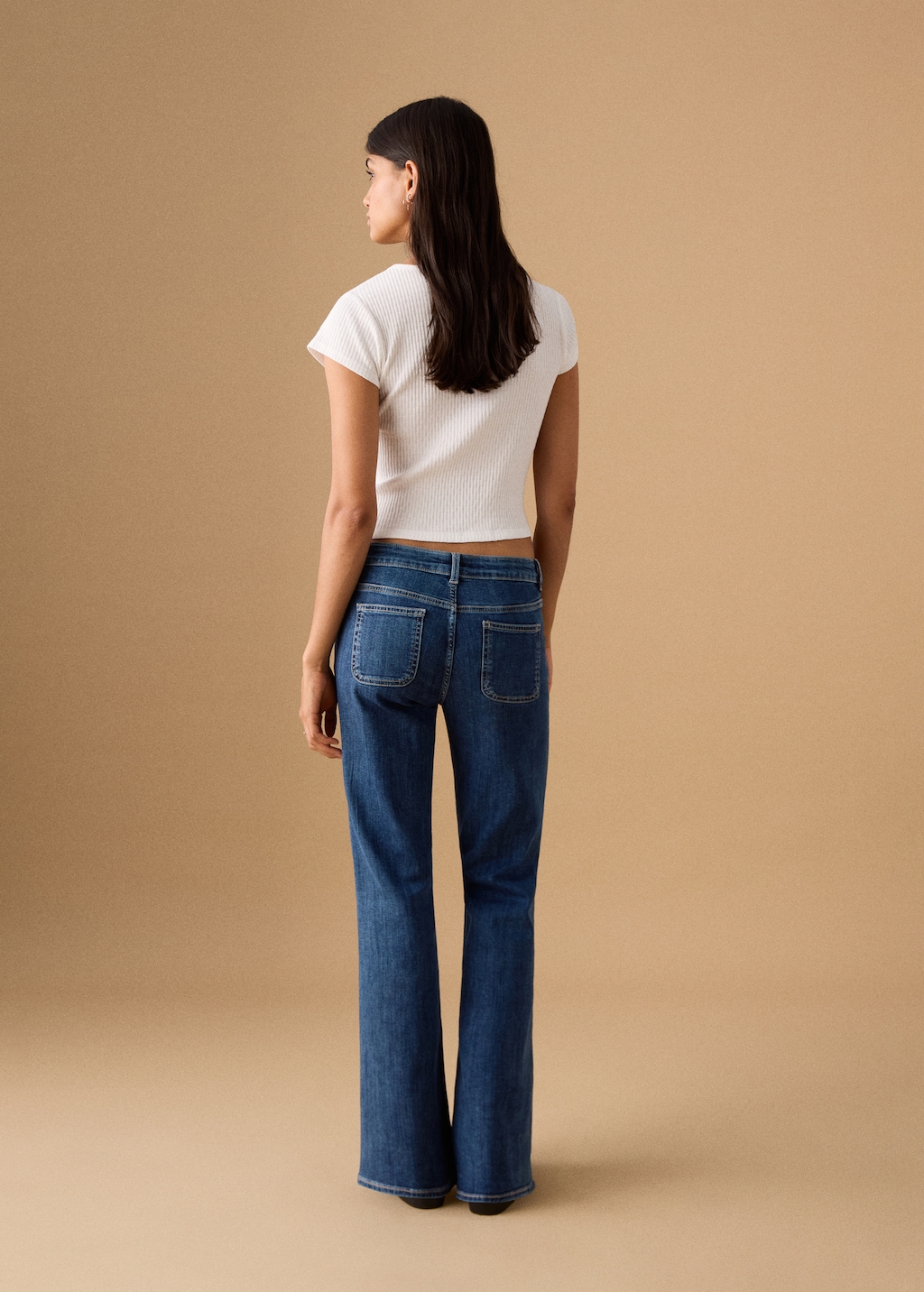 Flared jeans with studs