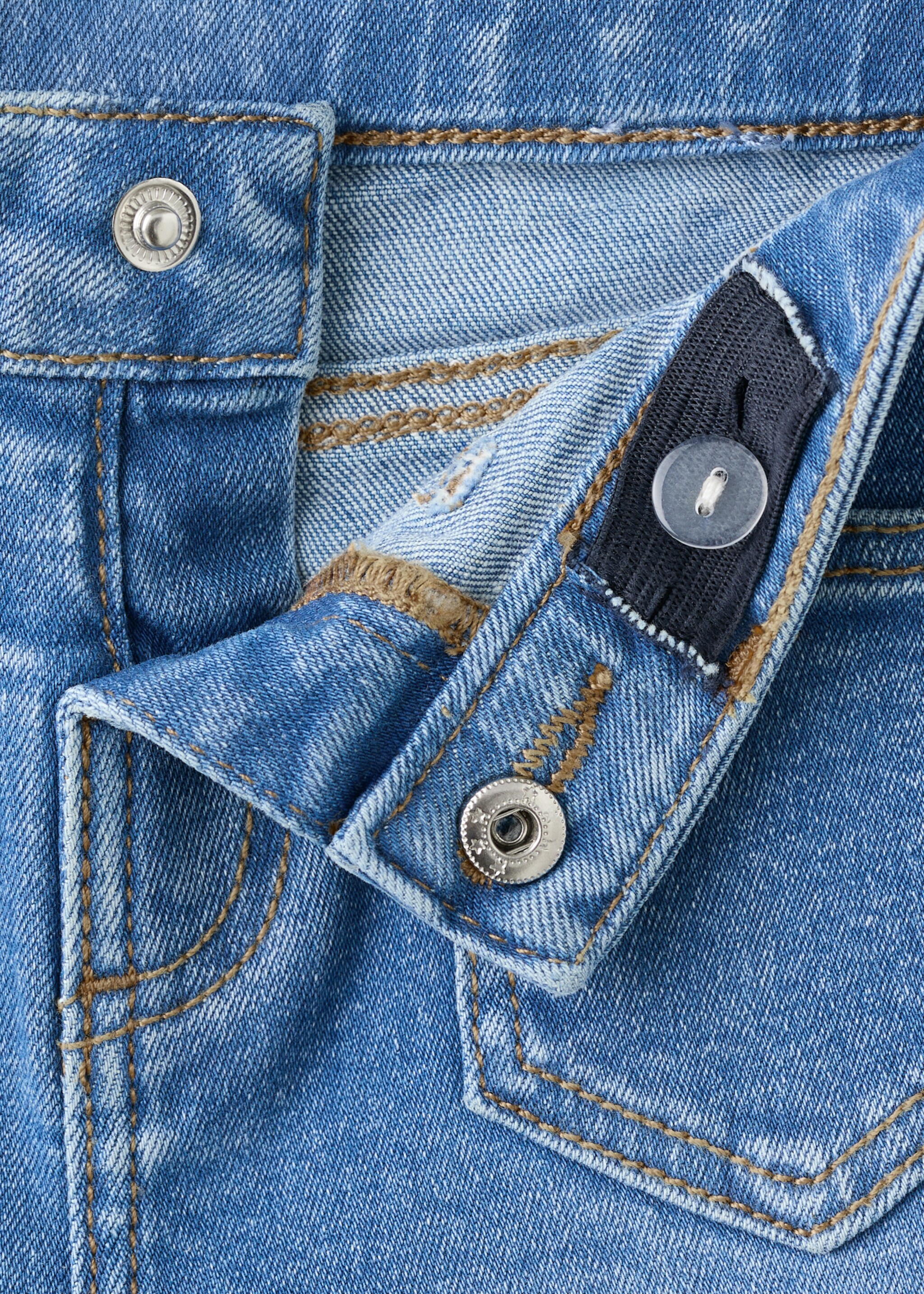 Frayed low-rise skinny jeans - Details of the article 8, Medium Blue. Ref: 27011253-00.