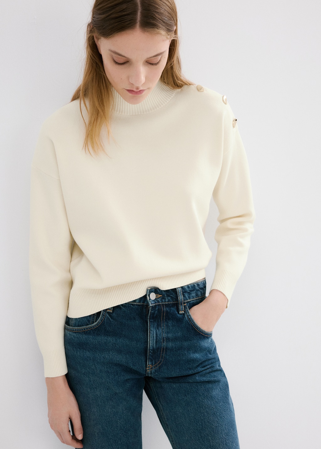 Knitted sweater with jewel buttons