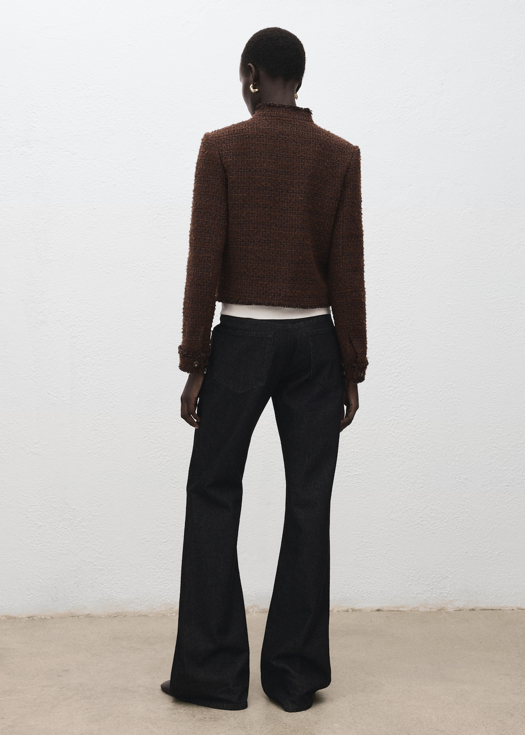 Tweed jacket with frayed ends