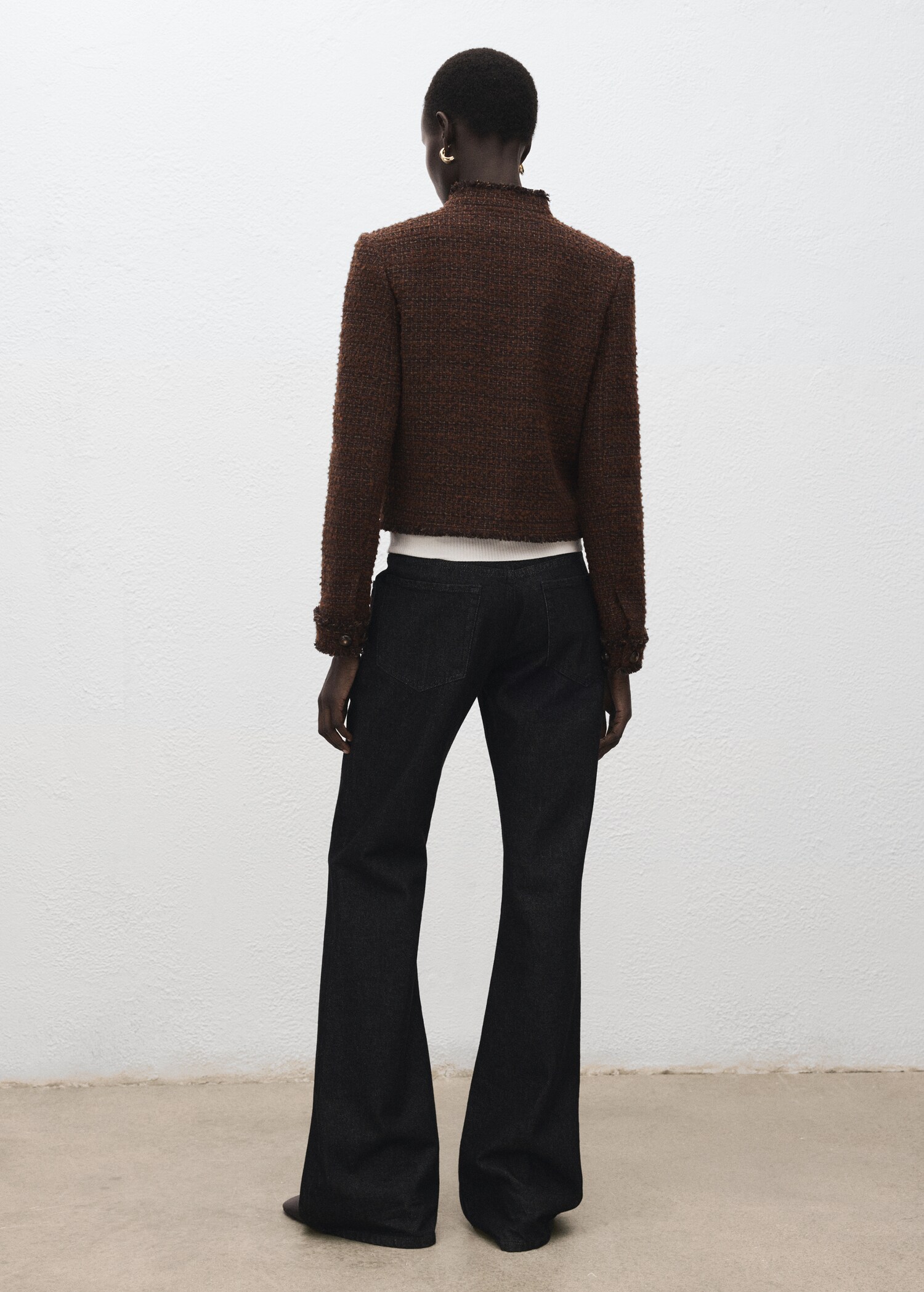 Tweed jacket with frayed ends - Reverse of the article