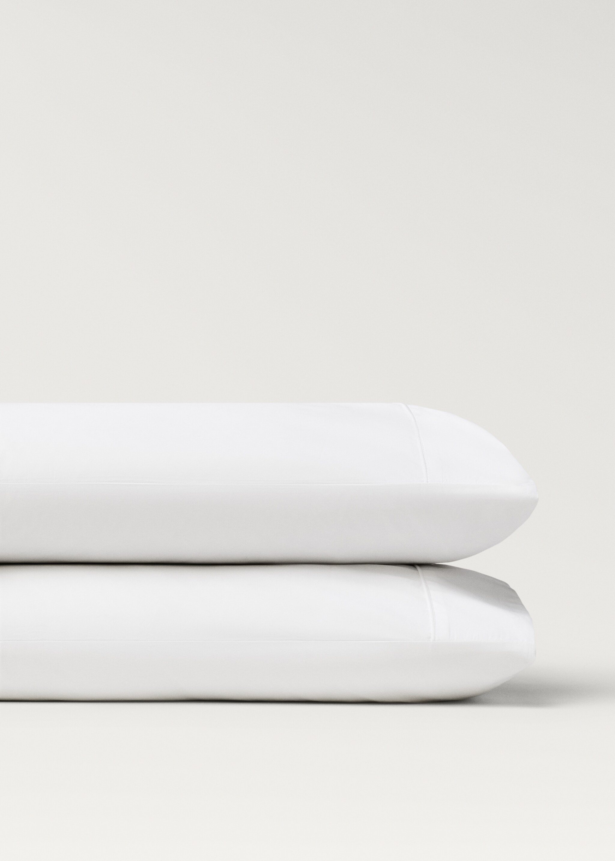 Two 500-thread count cotton percale pillowcases with rounded piping detail 50x75 cm - Details of the article 1, White. Ref: 27012941-00.