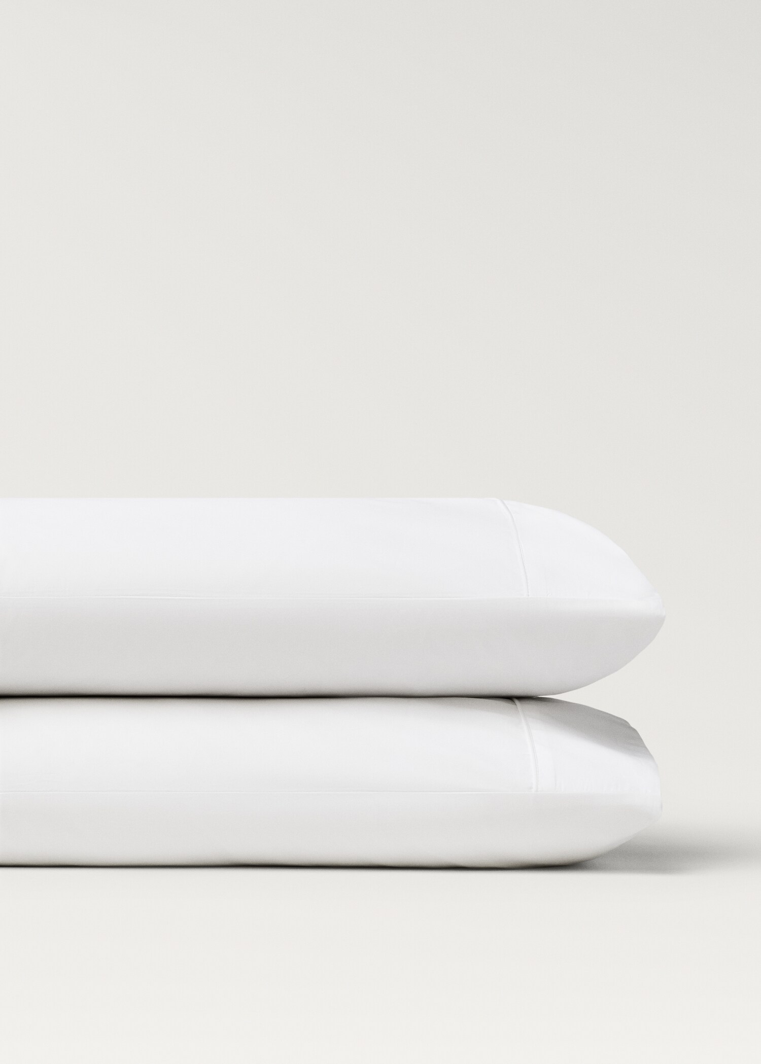 Two 500-thread count cotton percale pillowcases with rounded piping detail 50x75 cm - Details of the article 1