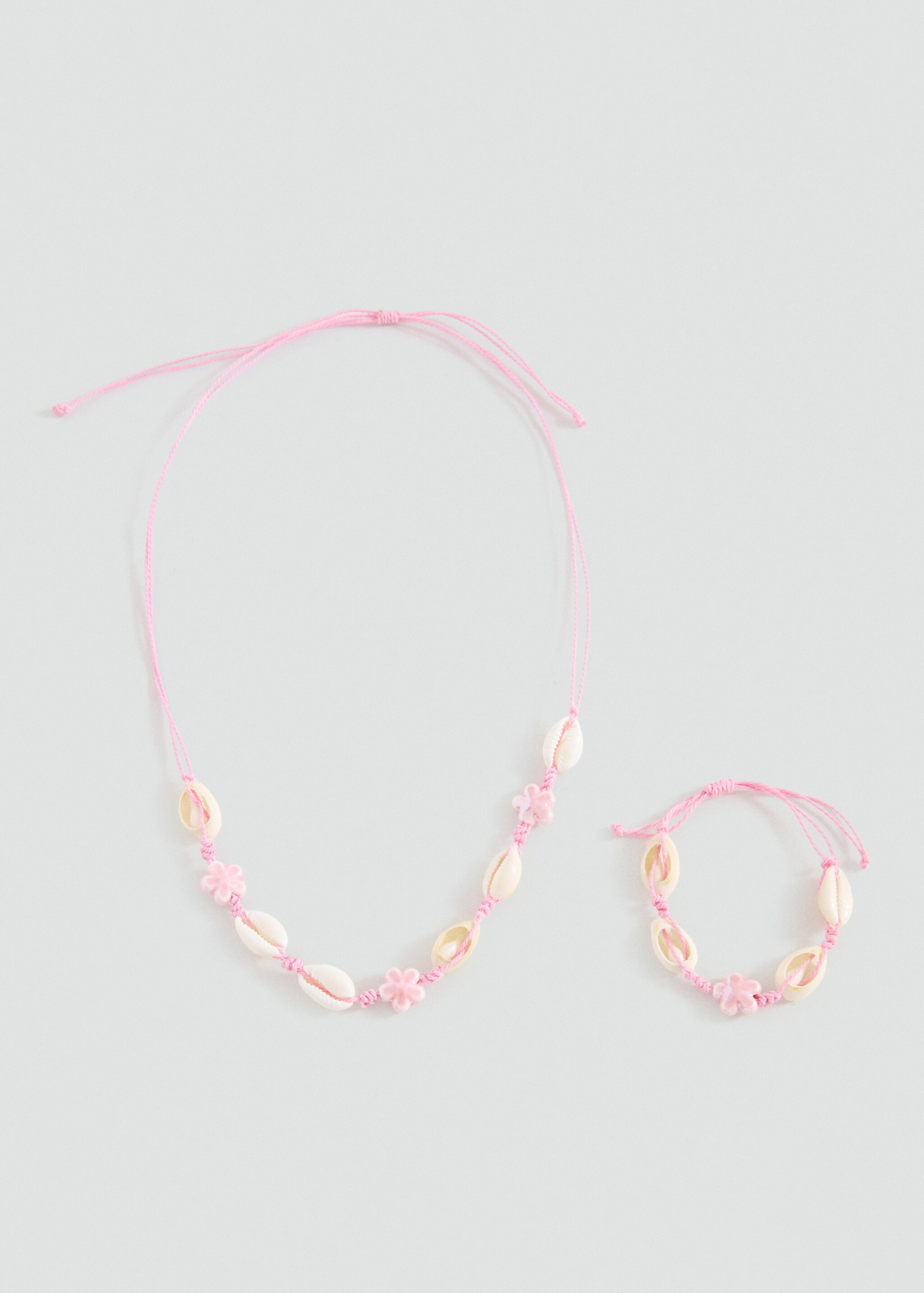 Lot collier et bracelet - Article sans modèle, Rose pâle. Ref: 27014784-00.