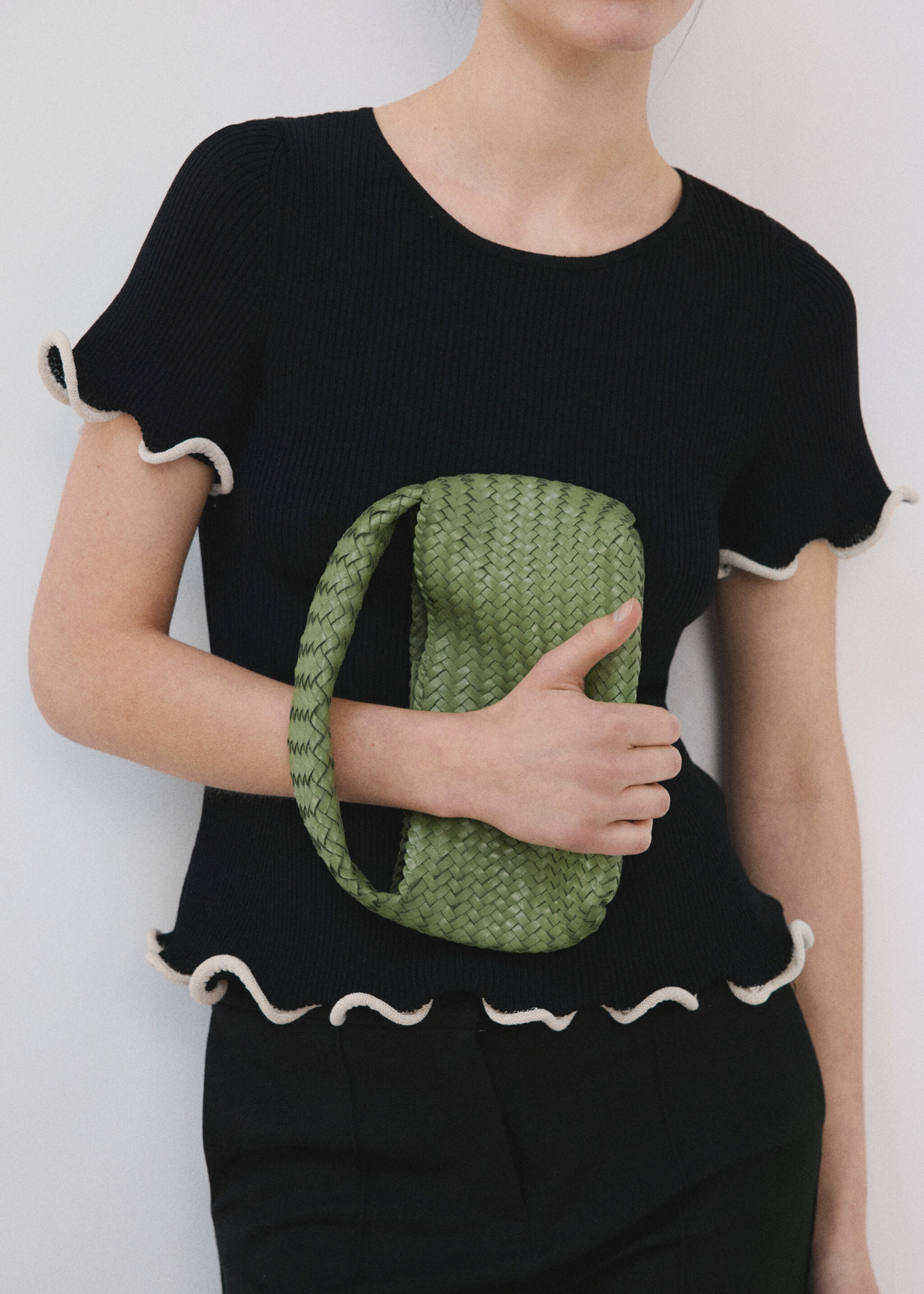 Peplum jumper with contrasting trims - Details of the article 6, Black. Ref: 27015846-00.