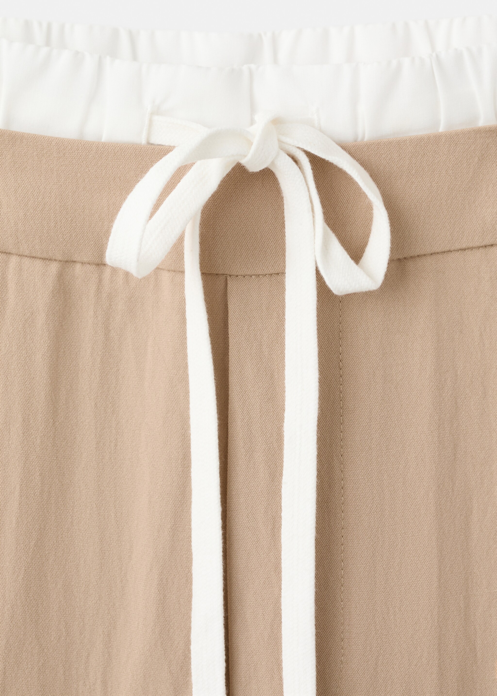 Lyocell trousers with a combined waistband - Details of the article 8, Beige. Ref: 27015960-00.