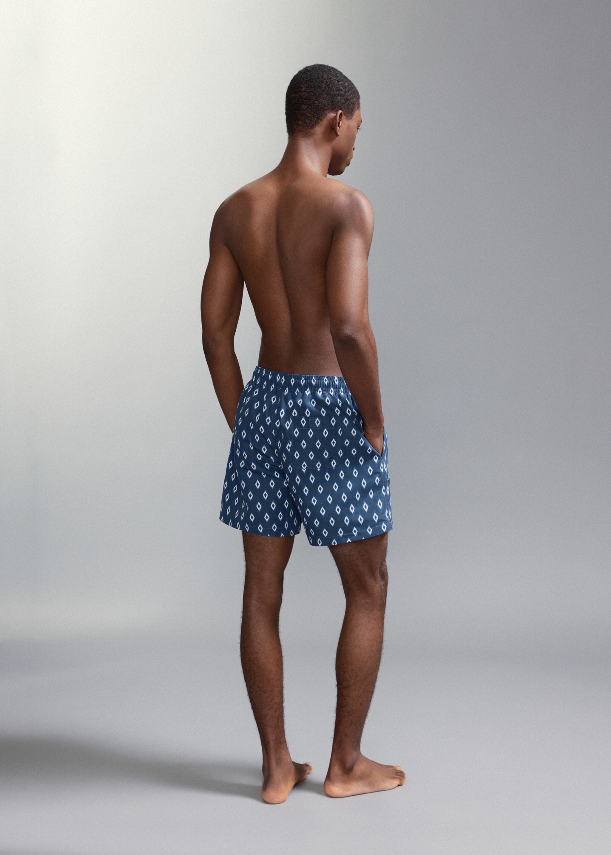 Ethnic-print swimsuit - Reverse of the article, Navy. Ref: 27015992-00.