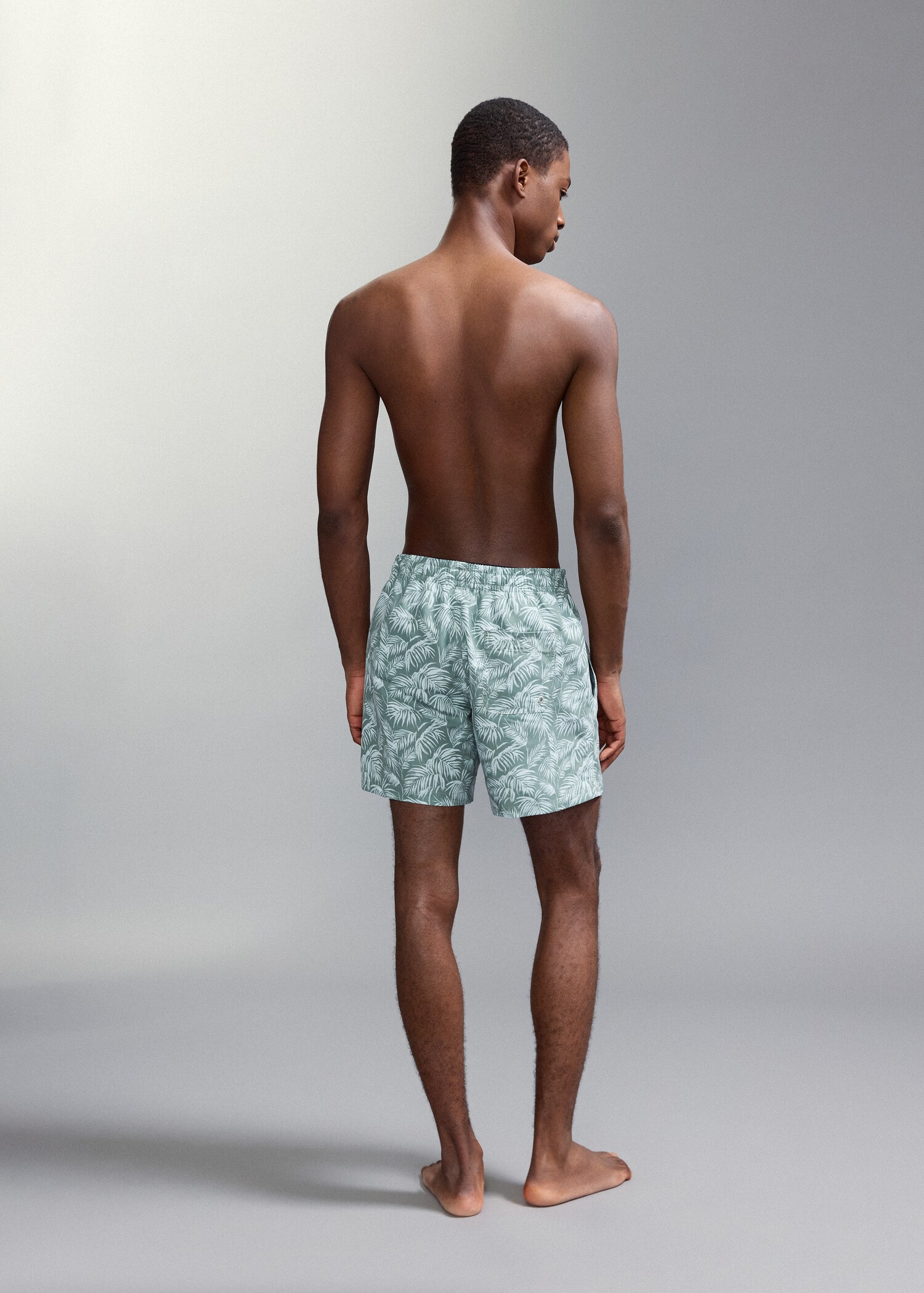 Palm trees print swimsuit trunks - Reverse of the article