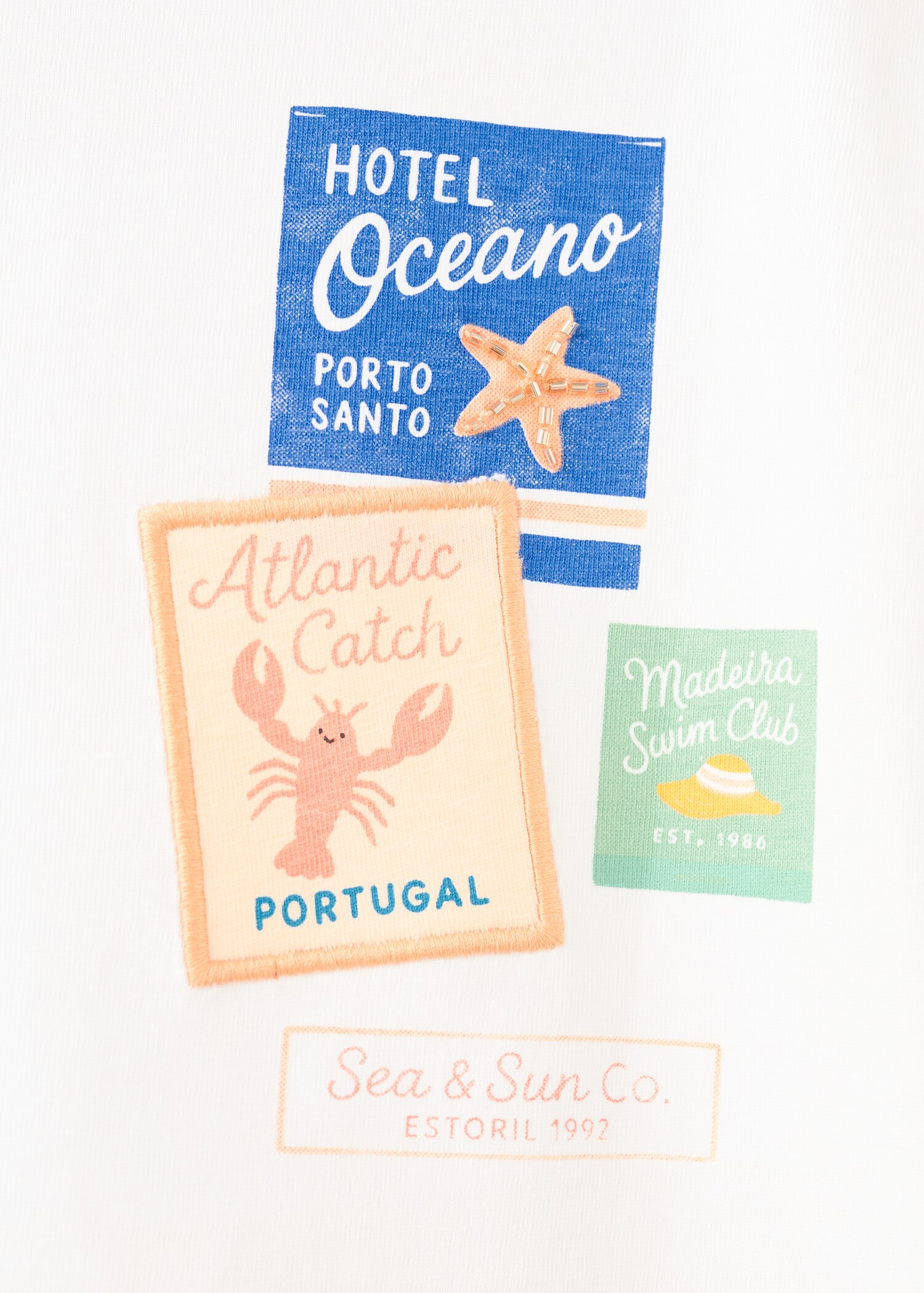 Футболка з принтом та декоративними бантиками - Детальніше про товар 8