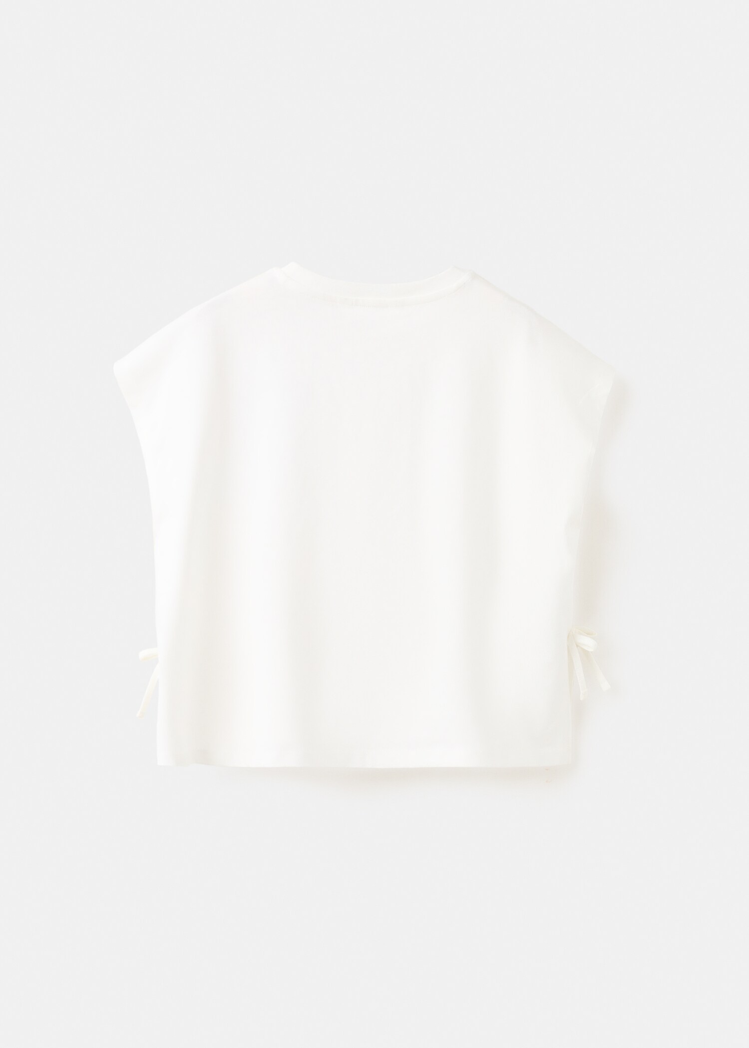 Футболка з принтом та декоративними бантиками - Зворотна сторона товару