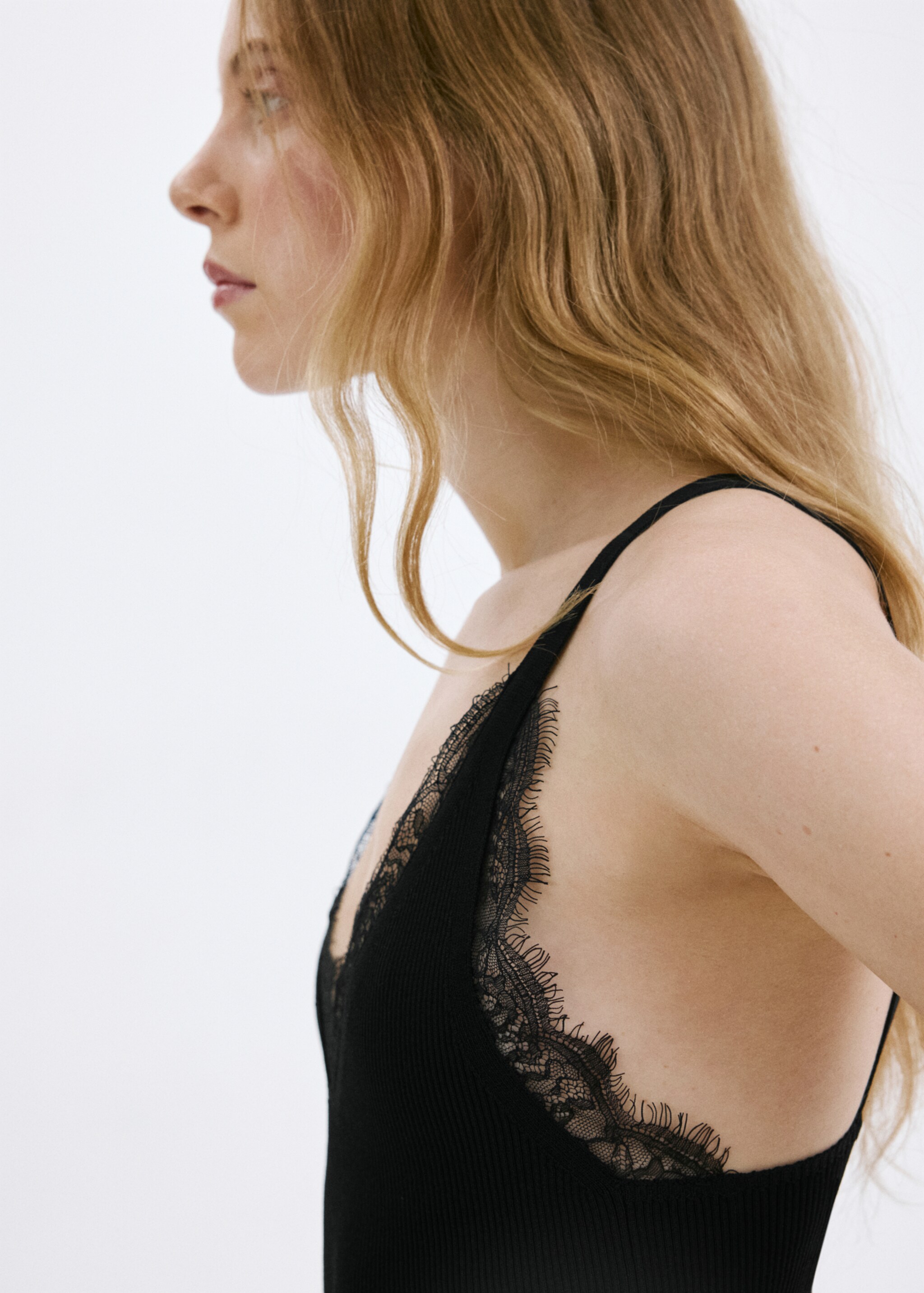 Asymmetrical lace-trimmed top - Details of the article 1, Black. Ref: 27017142-00.