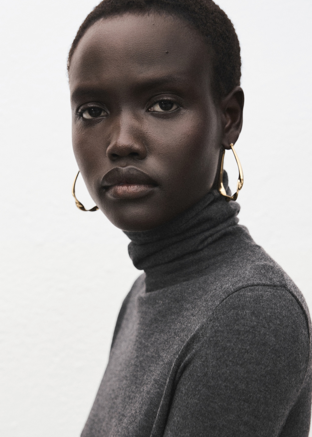 Mango Turtleneck sweater with brooch