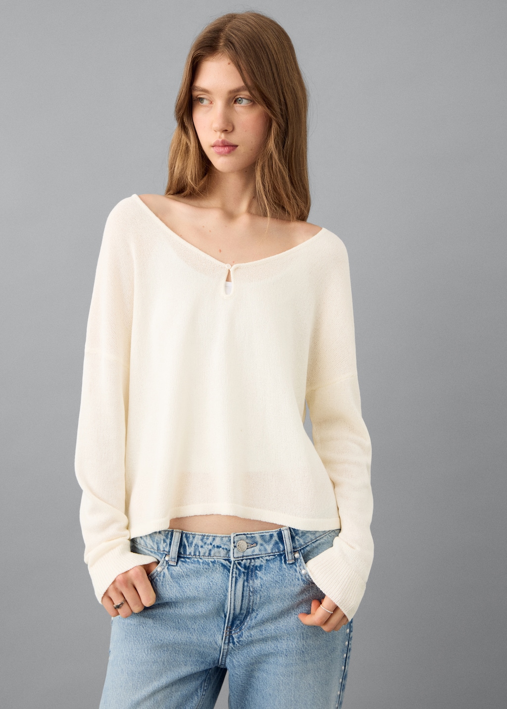 Cut-out knitted sweater