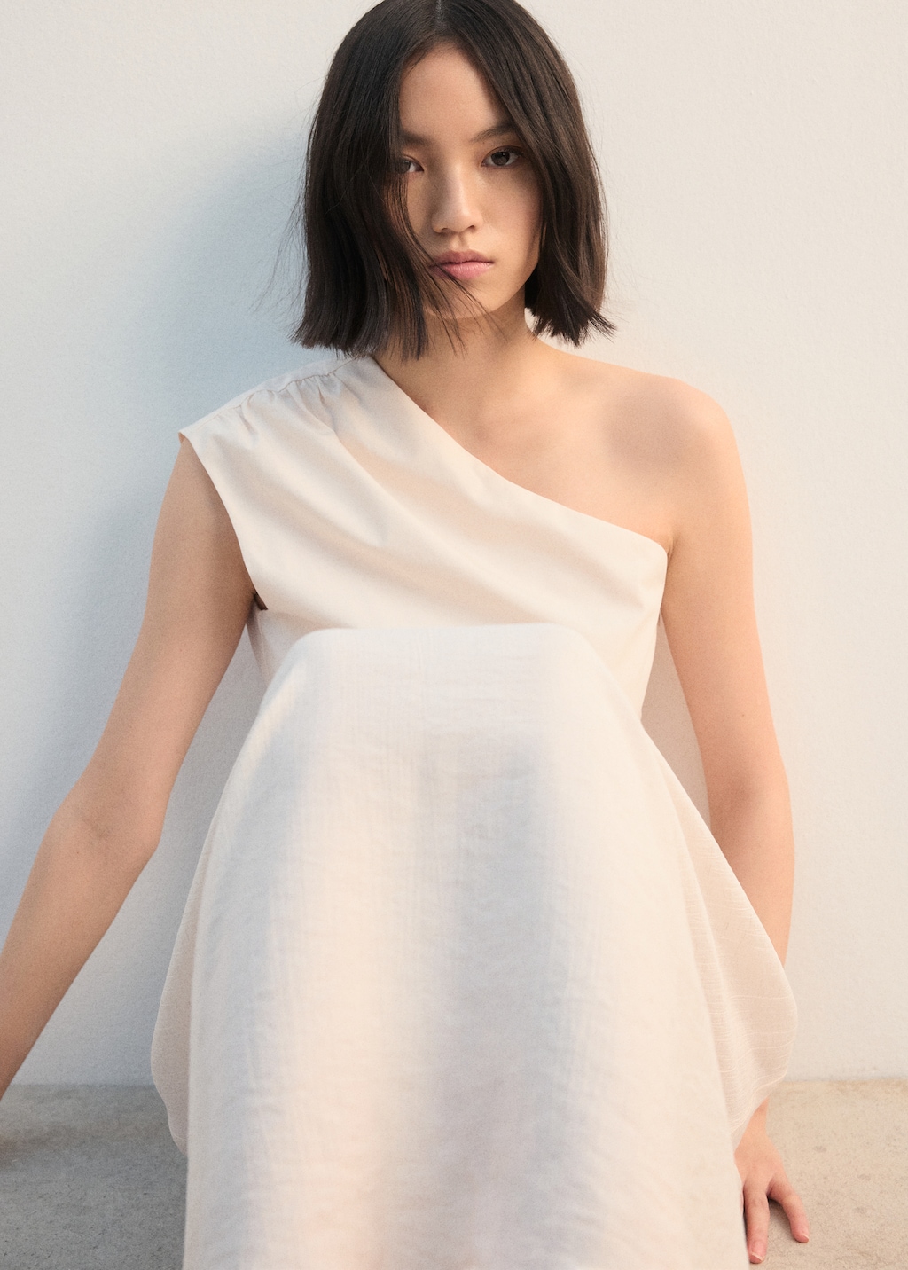 Asymmetrical pleated dress