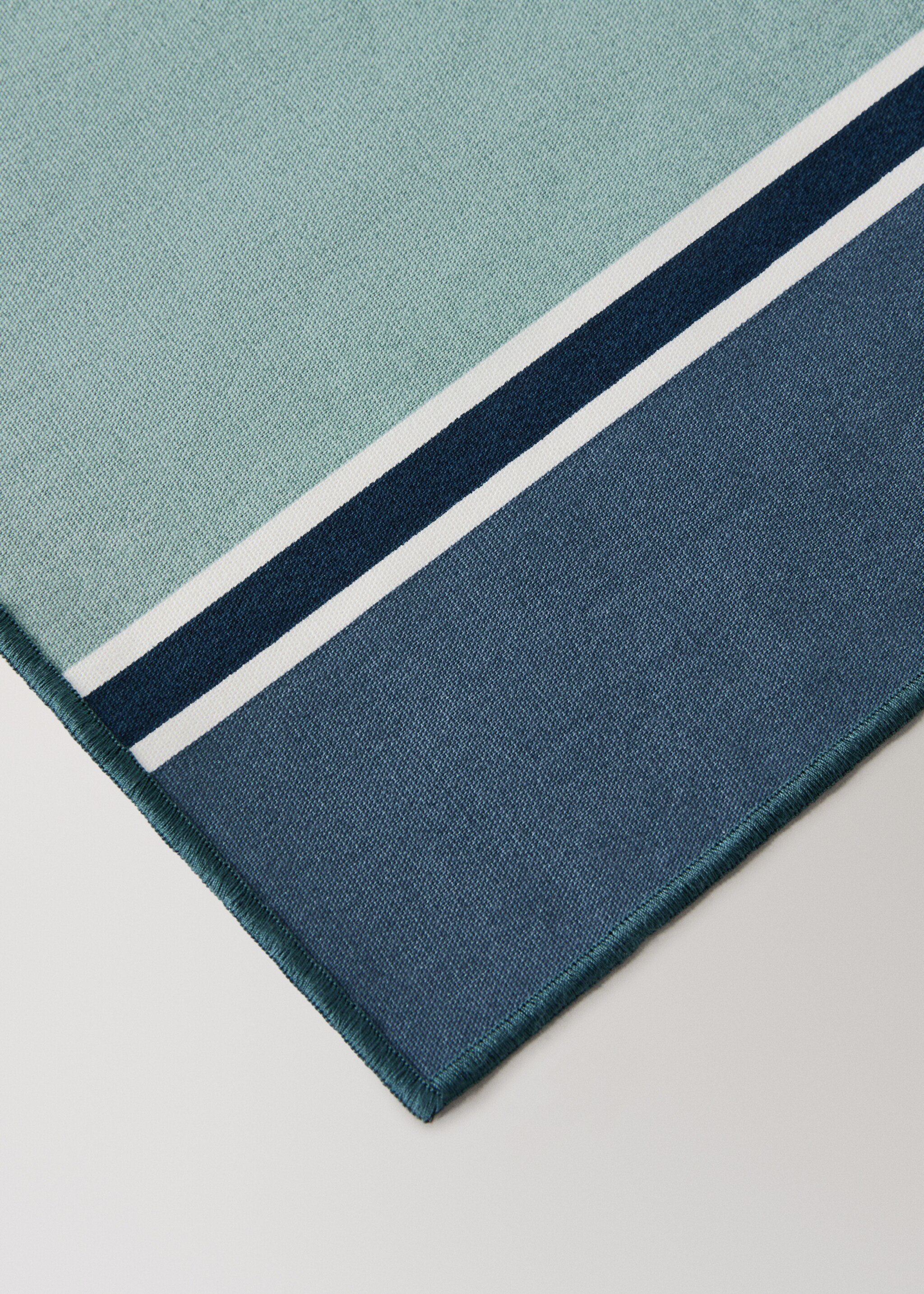Resin-coated striped table mats - Details of the article 2, Blue. Ref: 27023296-00.